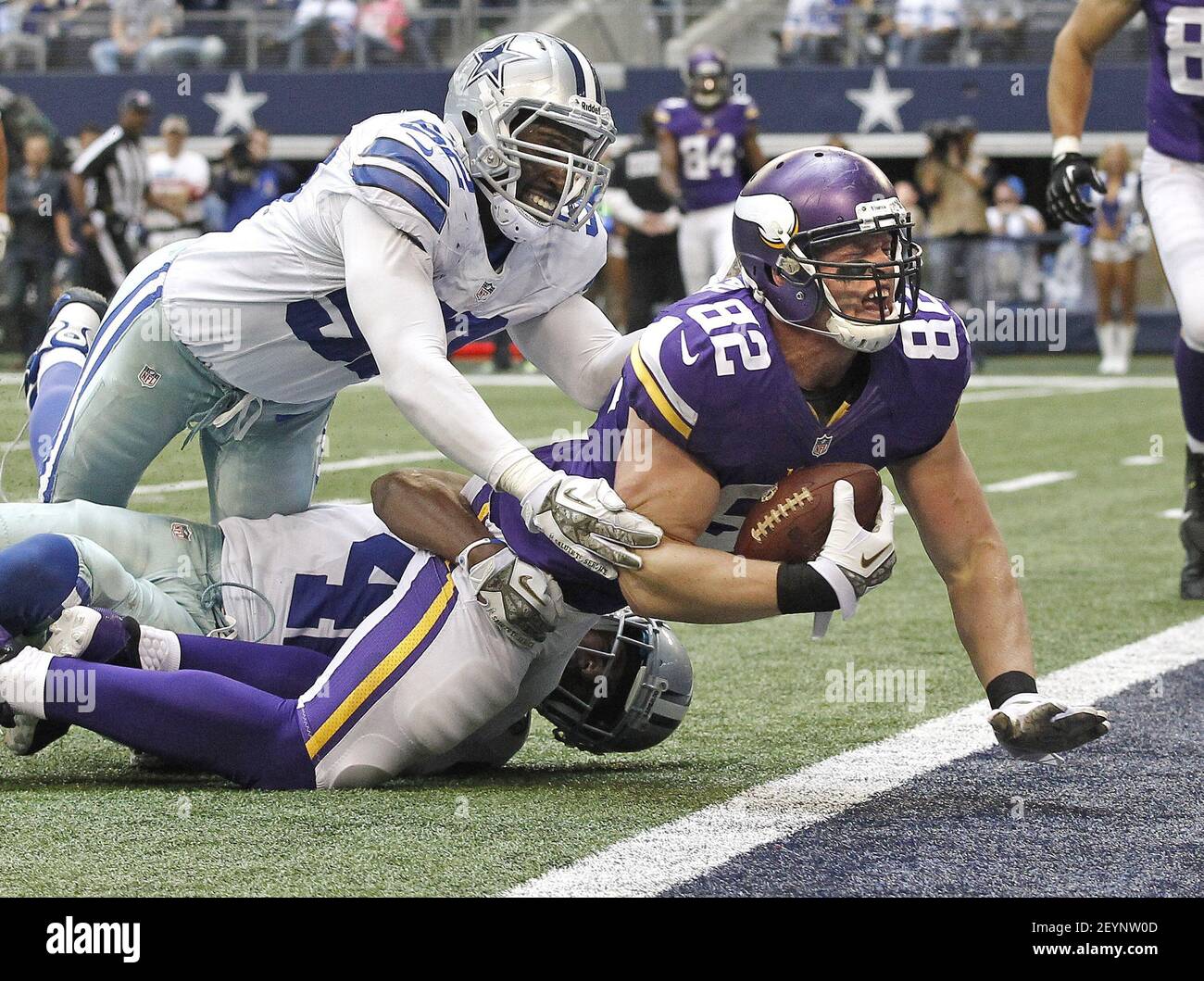 Dallas Cowboys linebacker Justin Durant and safety Barry Church can't prevent the Minnesota Vikings' Kyle Rudolph from reaching the end zone for a touchdown in the third quarter at AT&T Stadium in Arlington, Texas, Sunday, October 3, 2013. The Cowboys defeated the Vikings, 27-23. (Photo by Ron T. Ennis/Fort Worth Star-Telegram/MCT/Sipa USA) Stock Photo