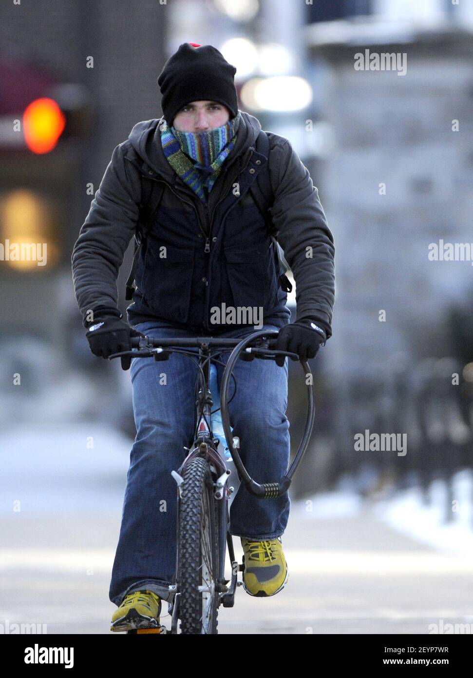 Penn State University Student Ben Sepe Tries To Stay Warm As He Rides His Bike To Class Tuesday January 22 13 Temperatures In State College Pennsylvania Were In The Single Digits With