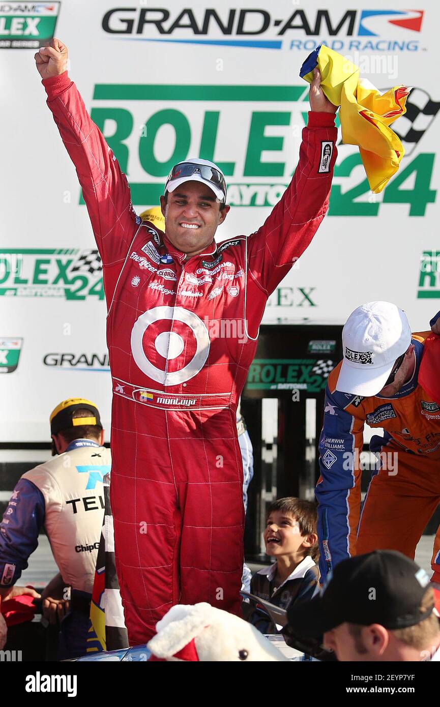 Chip Ganassi Racing team driver Juan Pablo Montoya celebrates in Victory  Lane after winning the Rolex 24 Grand-Am race at Daytona International  Speedway in Daytona Beach, Florida, Sunday, January 27, 2013. Drivers