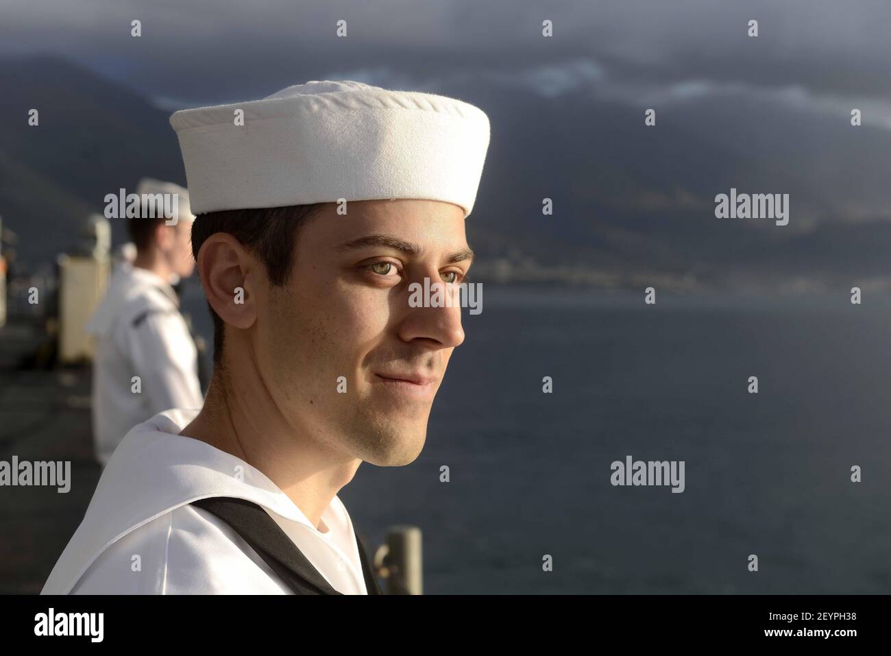 GAETA, Italy (Oct. 3, 2015) Information Systems Technician 3rd Class Michael Tontz mans the rails as the U.S. 6th Fleet command and control ship USS Mount Whitney (LCC 20) pulls into Gaeta, Italy after a nine month dry-dock period in Rijeka, Croatia. Mount Whitney, forward deployed to Gaeta, Italy, operates with a combined crew of U.S. Navy Sailors and Military Sealift Command civil service mariners. (Photo by Mass Communication Specialist 1st Class Mike Wright/U.S. Navy) 151003-N-VY489-096 *** Please Use Credit from Credit Field *** Stock Photo