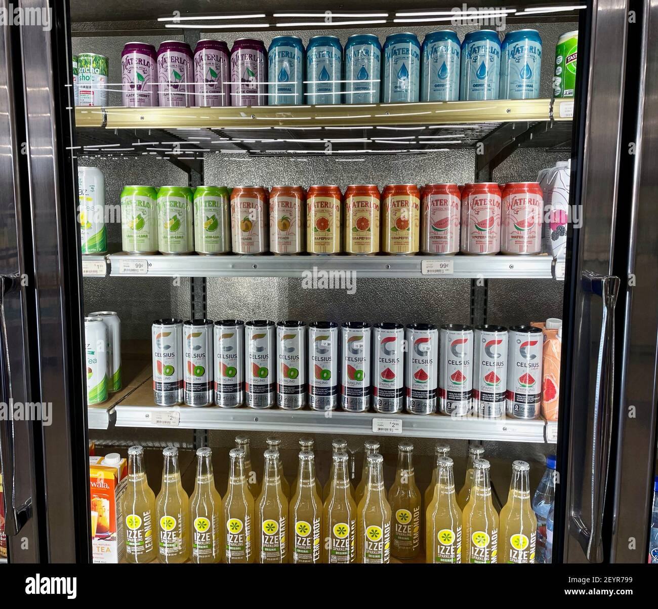 FRESNO, UNITED STATES - Jan 15, 2021: A photo of a Cold Fridge Door Filled  with Izze, WaterLoo and Celsius drinks in cans in an Organic Store Stock  Photo - Alamy
