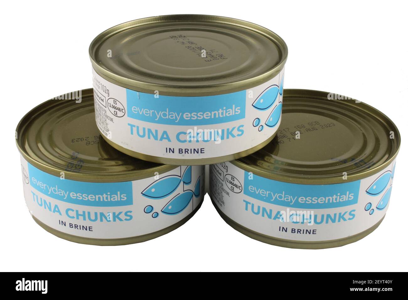 three tins of Tuna chunks in brine isolated on a white background with