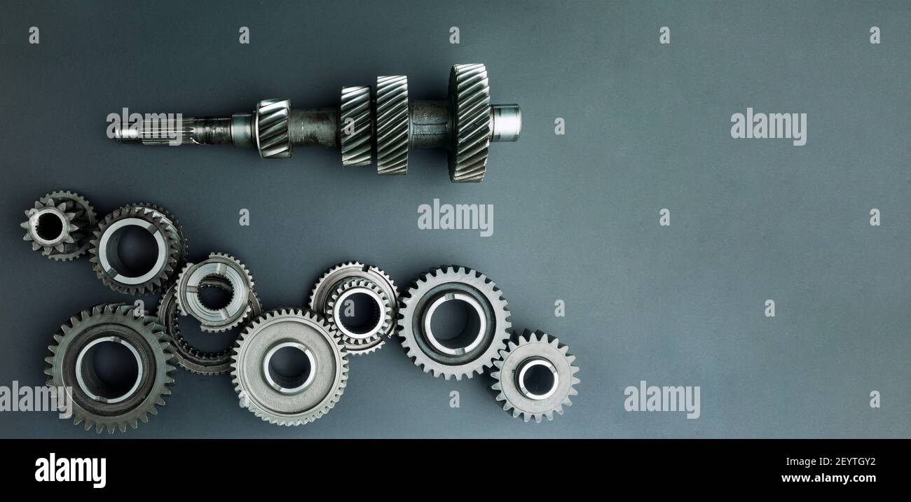 Industrial gears and cogs on paper background. Copy space Stock Photo Alamy