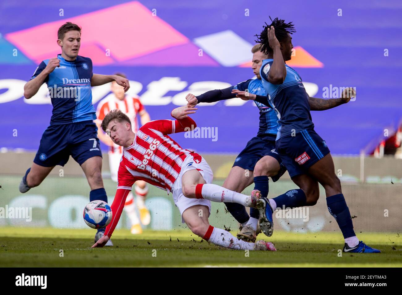 6th March 2021; Bet365 Stadium, Stoke, Staffordshire, England; English Football League Championship Football, Stoke City versus Wycombe Wanderers; Jack Clarke of Stoke City is tackled Stock Photo