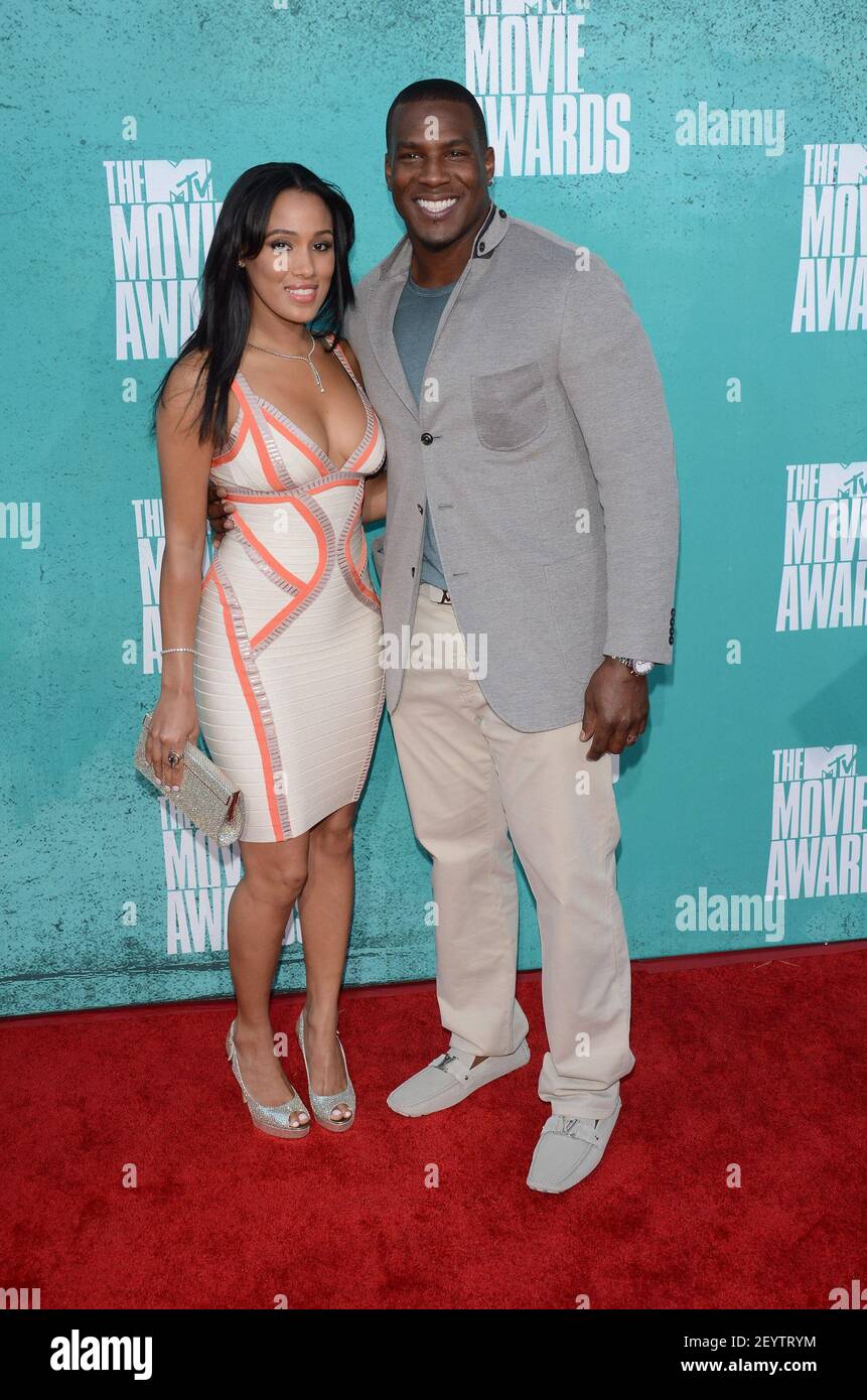 Antonio Gates and wife Sasha Dindayal. 3 June, 2012, Universal City