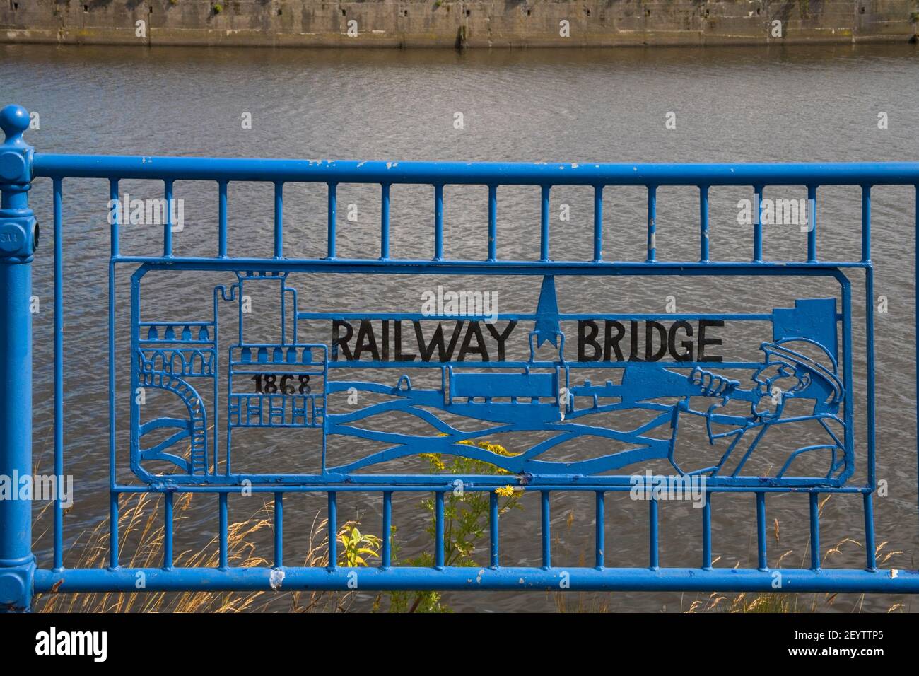 an ornate sign for a railway bridge in runcorn an the wirral Stock Photo