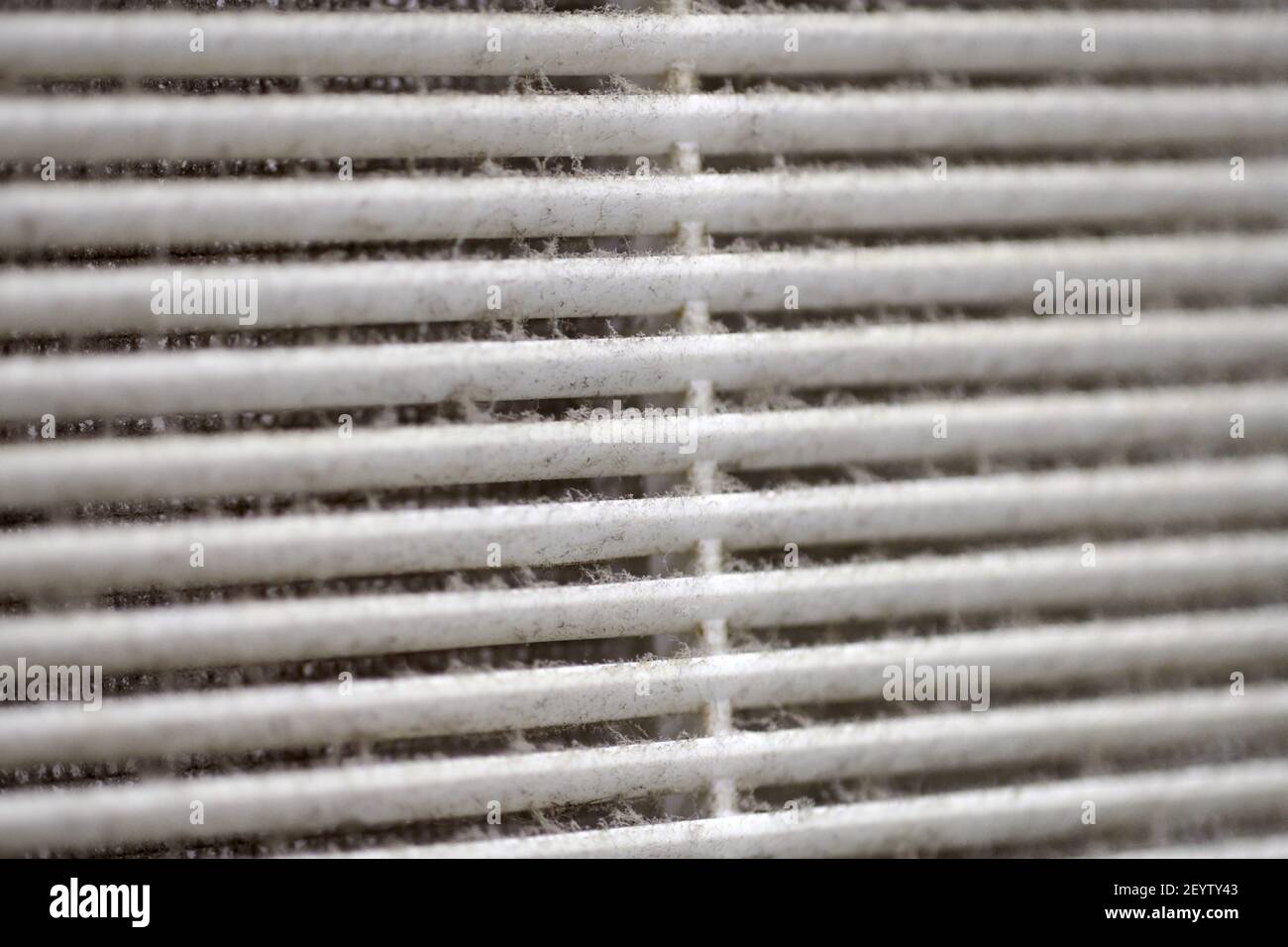 Extremely dirty air ventilation grill of HVAC with dusty clogged filter