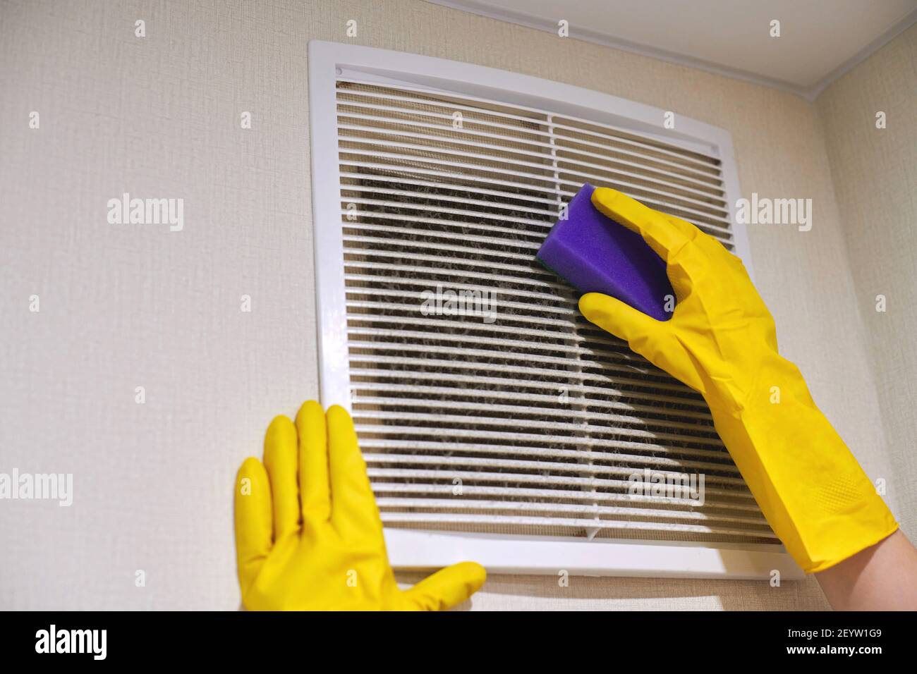 Close-up wall ventilation grille with pull cord air flow control, hand  closes the shutter using a cord Stock Photo - Alamy