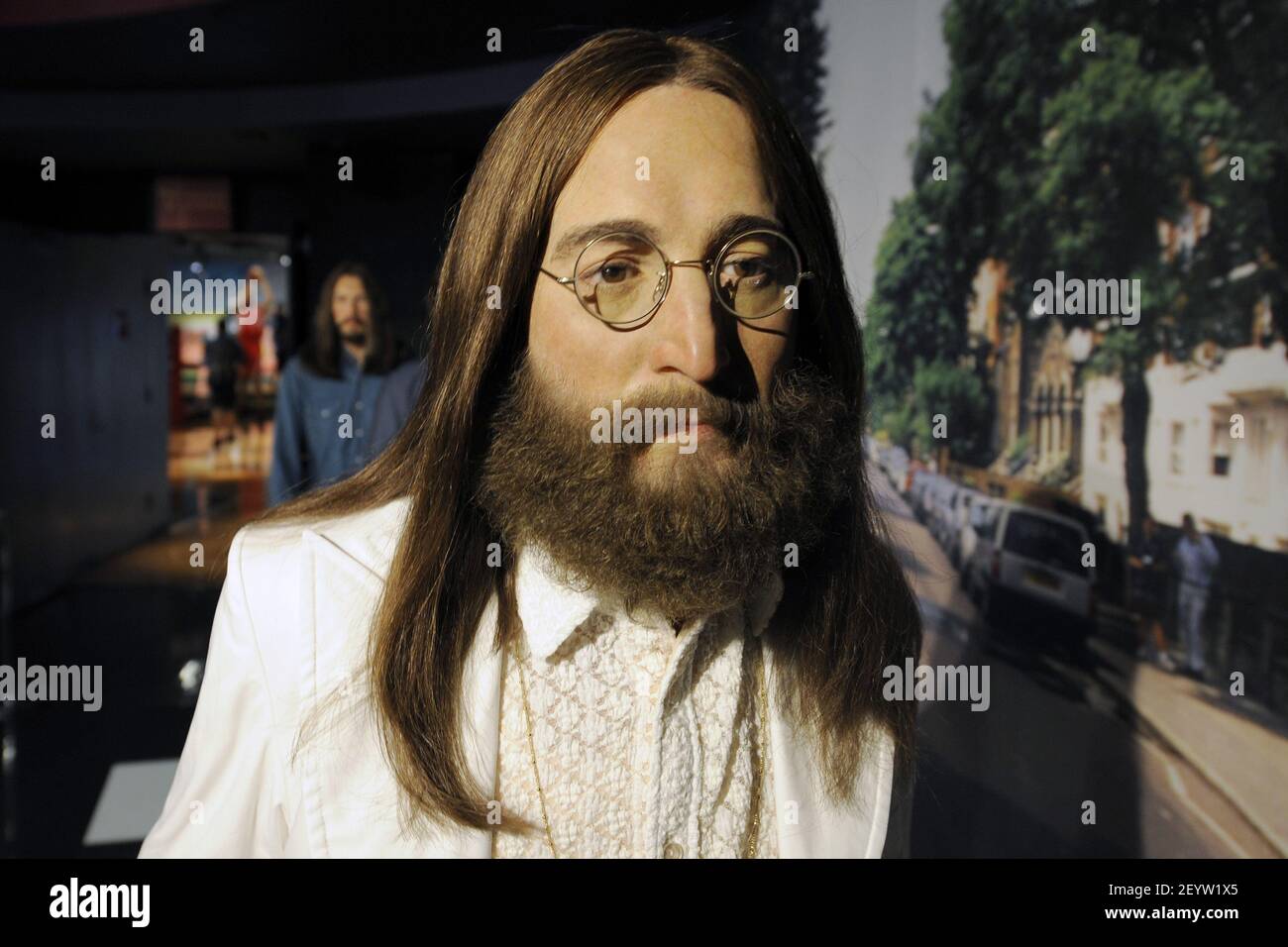 14 June 2012 - New York - The Beatles Wax figure of John Lennon, posed in homage of the 1969 'Abbey Road' album cover (photographed Iain Macmillan) is unveiled at Madame Tussauds New York on June 14, 2012, New York, NY. Photo Credit: Anthony Behar/Sipa USA Stock Photo