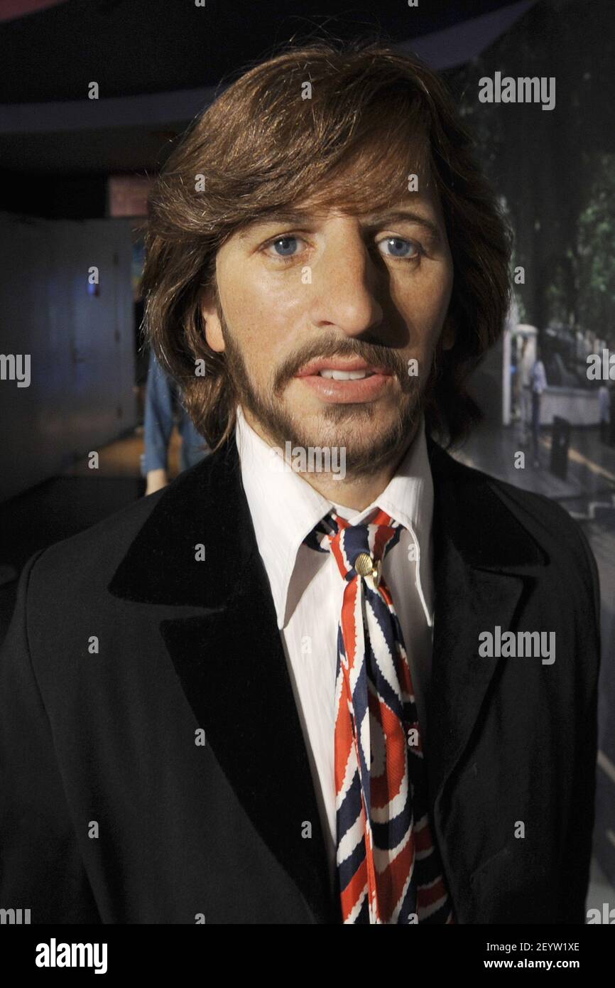 14 June 2012 - New York - The Beatles Wax figure of RIngo Starr, posed in homage of the 1969 'Abbey Road' album cover (photographed by Iain Macmillan), is unveiled at Madame Tussauds New York on June 14, 2012, New York, NY. Photo Credit: Anthony Behar/Sipa USA Stock Photo