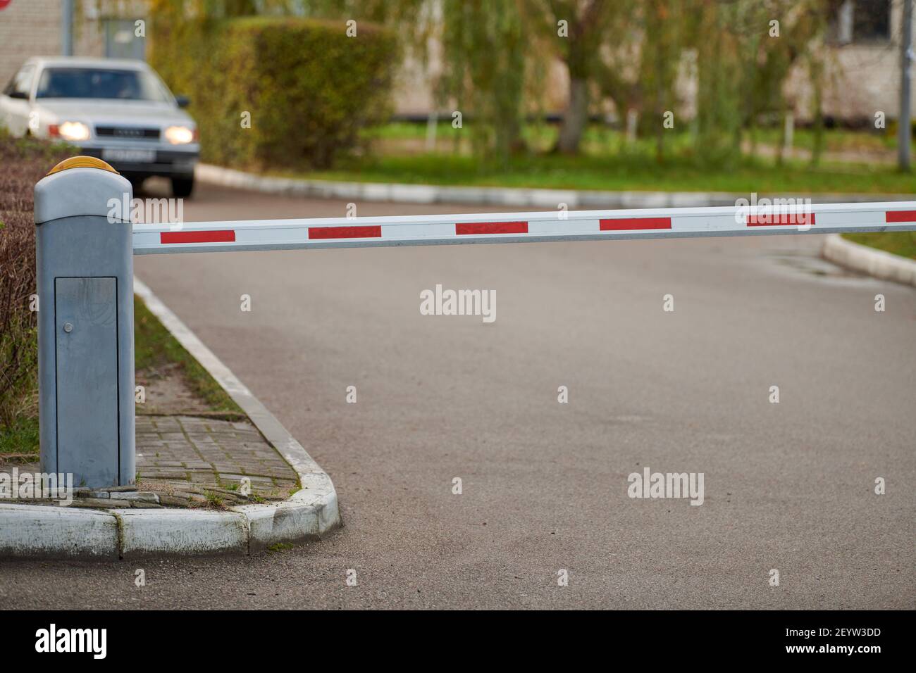Parking gate, automatic car barrier system for carpark security. White