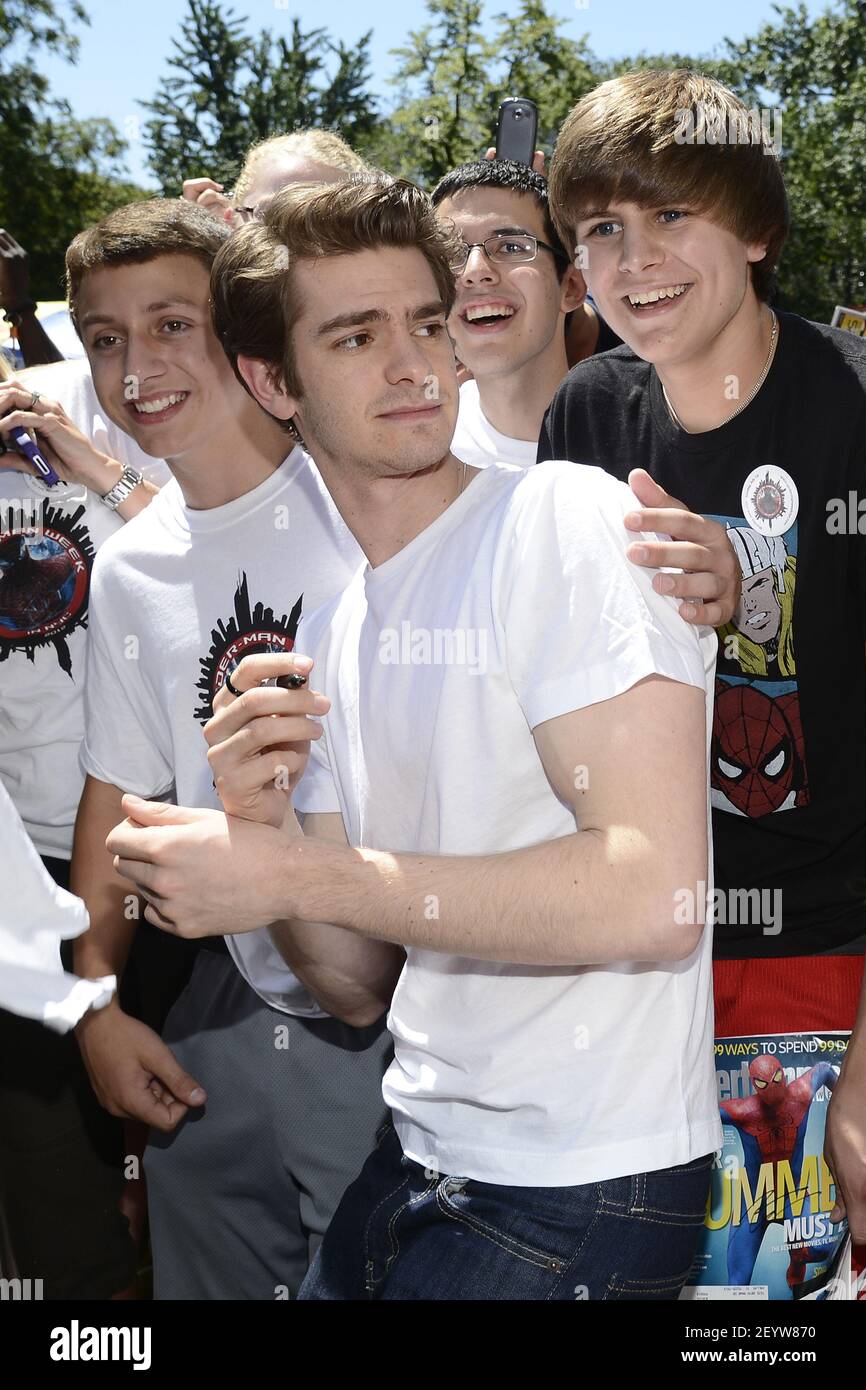 2 June 2012 - New York - Actor Andrew Garfield poses with fans in front of  the American Museum of Natural History on Manhattan's west side as he  delivers a Chilean Rose