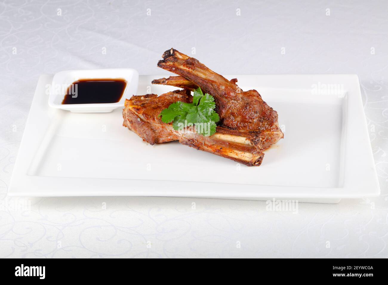 Roasted lamb with coriander leaves Stock Photo Alamy
