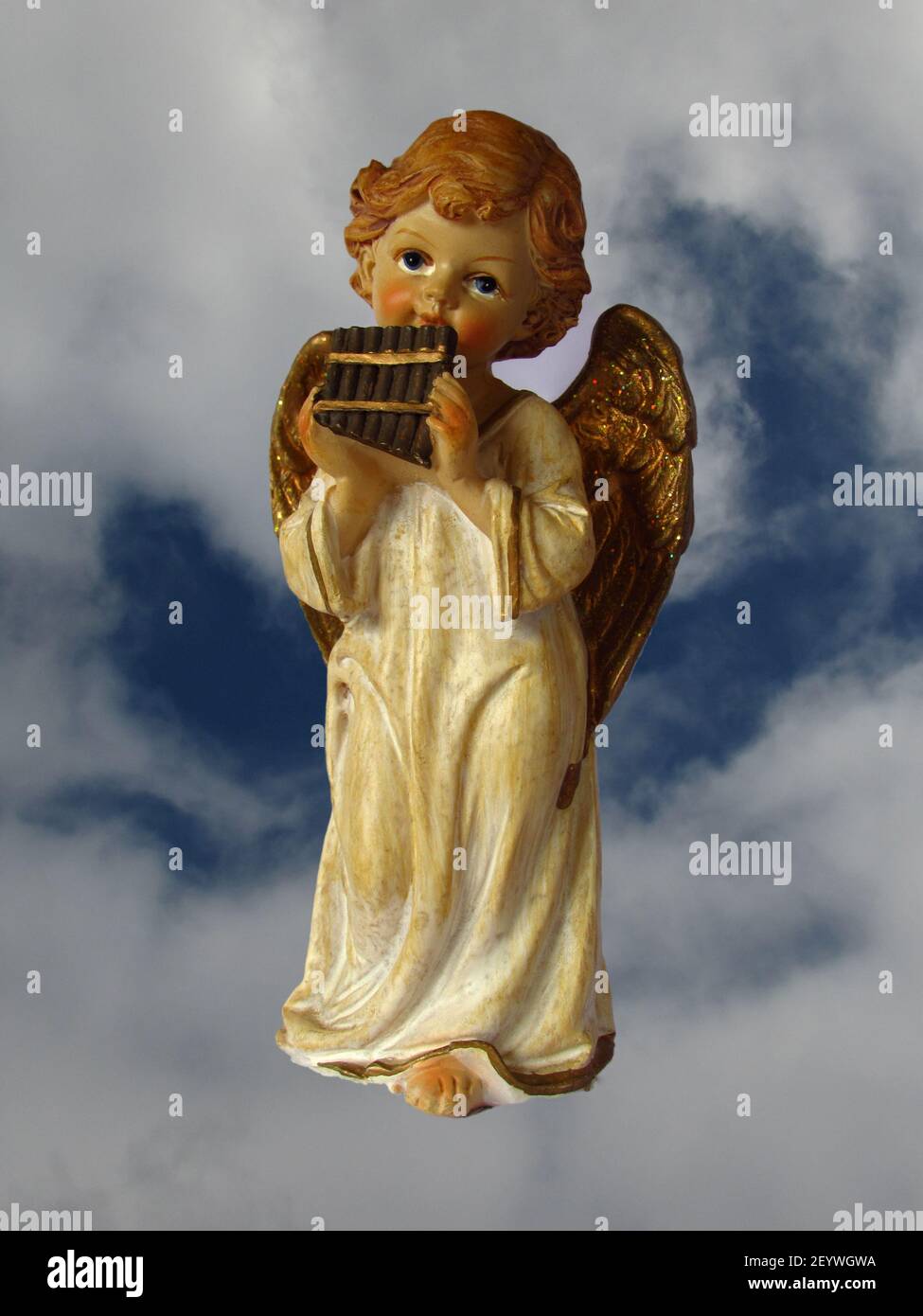 Angel (statue) in front of the sky, play pan flute, 2018 Stock Photo
