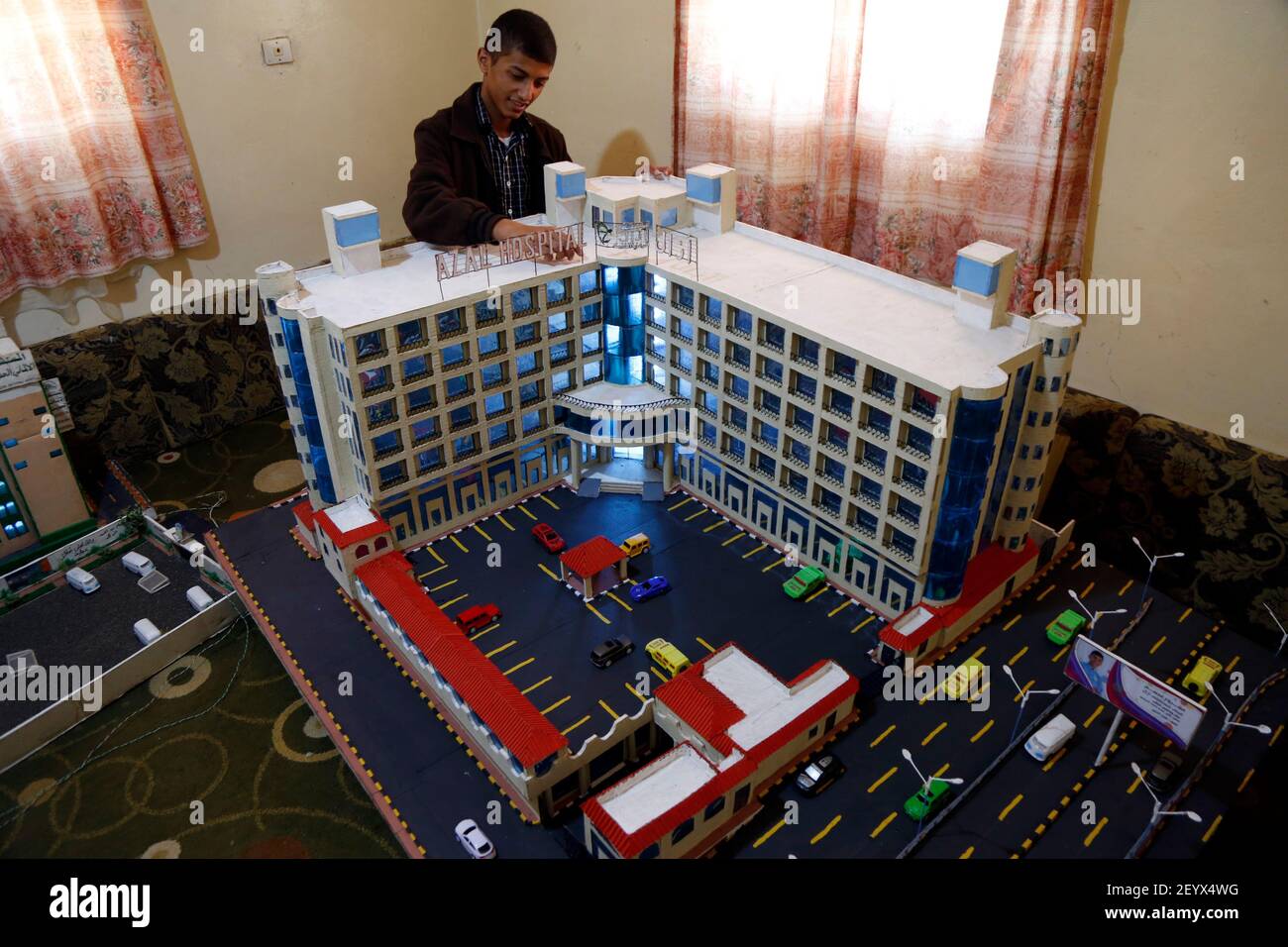 Sanaa, Yemen. 4th Mar, 2021. Musheer AlHzmi, stands beside the