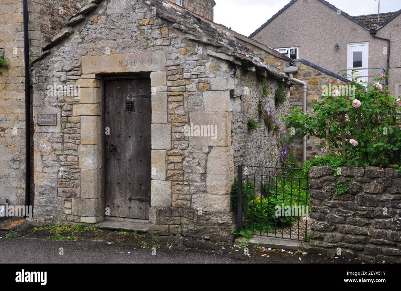 The Guard House in Nunney, Somerset. Constructed from local stone this small lock-up was used to detain local drunks and vagrants untill they were dea Stock Photo