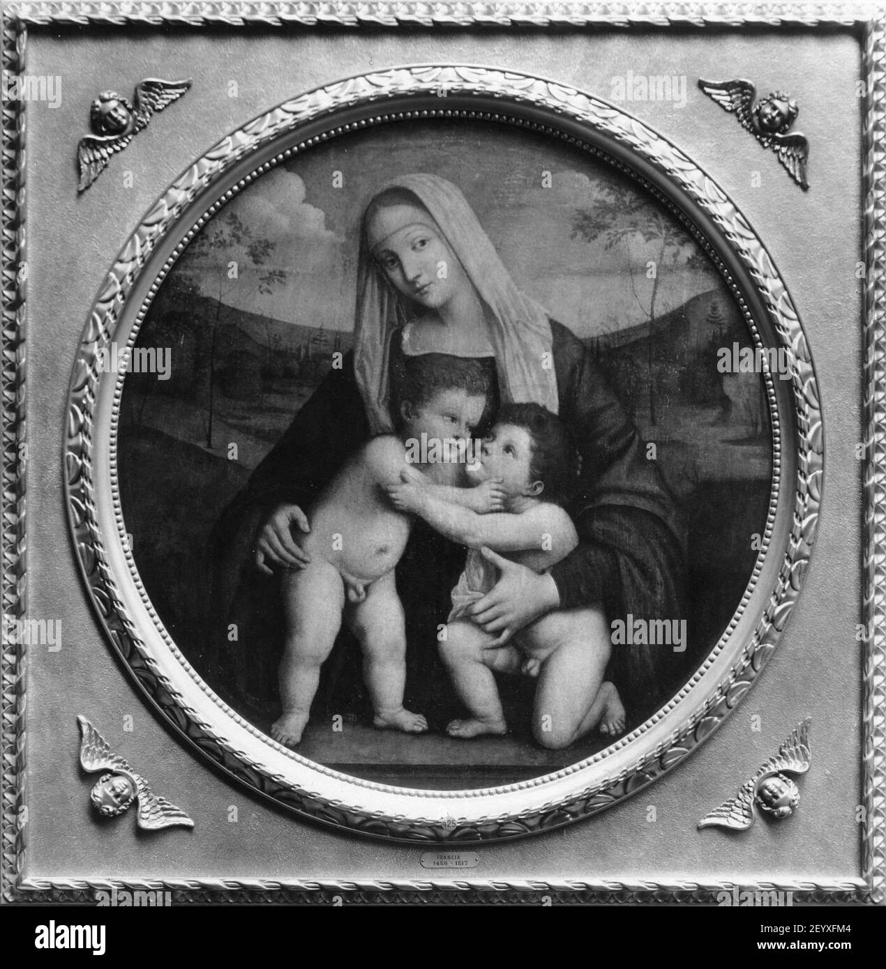 Piero di Cosimo - Madonna and Child and St John the Baptist Stock Photo