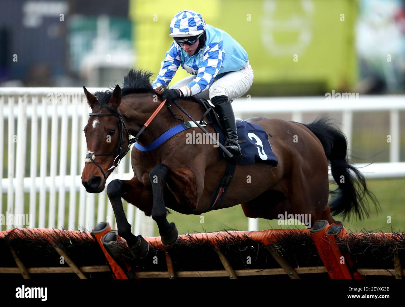 Erne River ridden by Charlie Hammond clears a fence on their way to winning the Virgin Bet Novices' Hurdle at Doncaster Racecourse. Picture date: Saturday March 6, 2021. Stock Photo