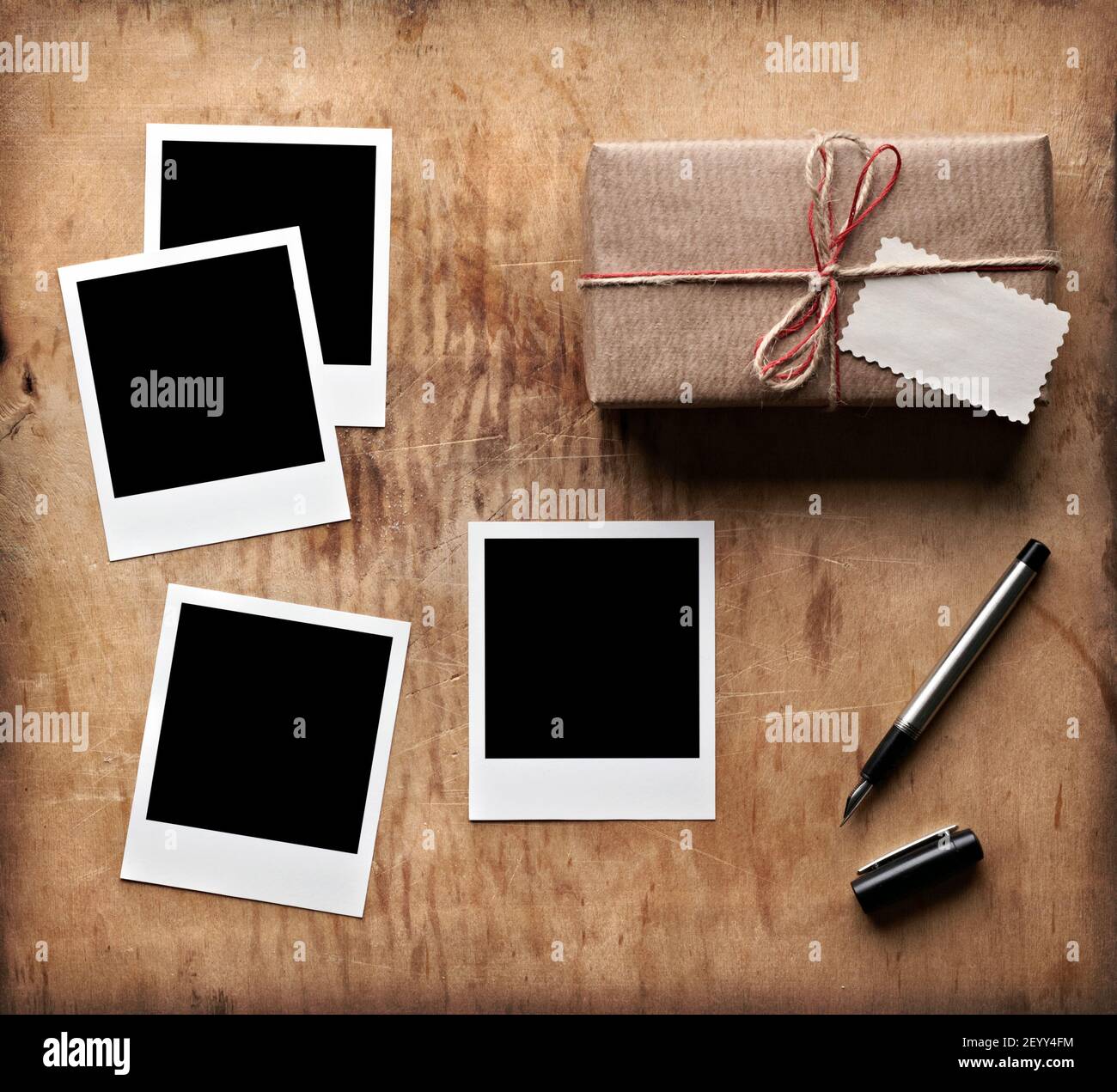 Gift box and blank photo frames hi-res stock photography and images - Alamy