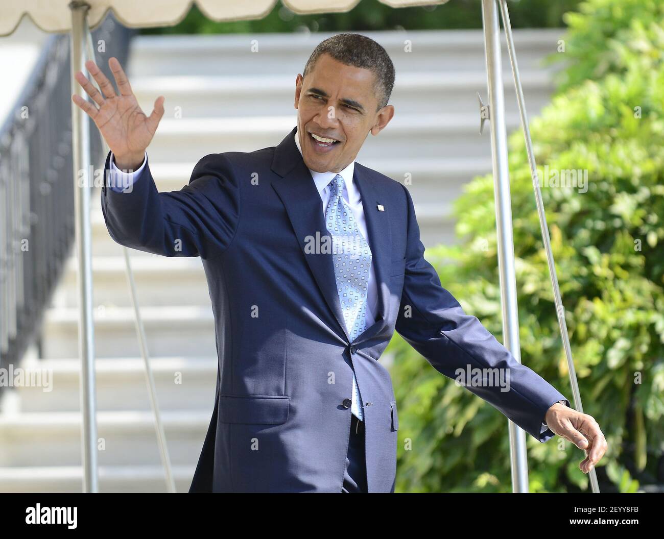 30 September 2012 - Washington, D.C. - United States President Barack Obama waves to the photographers as he departs the White House in Washington, D.C. for Henderson, Nevada on Sunday, September 30, 2012. Photo Credit: Ron Sachs/Pool/Sipa USA Stock Photo