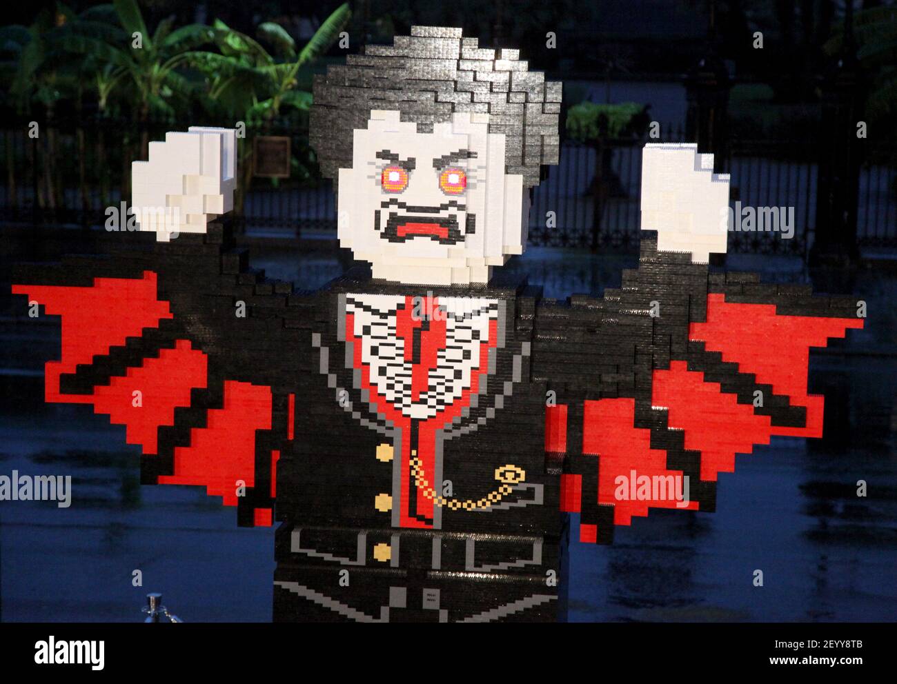 30 September 2012. New Orleans, Louisiana, USA. The world's largest ever Lego  Vampire stands in front of the St Louis Cathedral in Jackson Square.  Starting at sunset and building through the night,