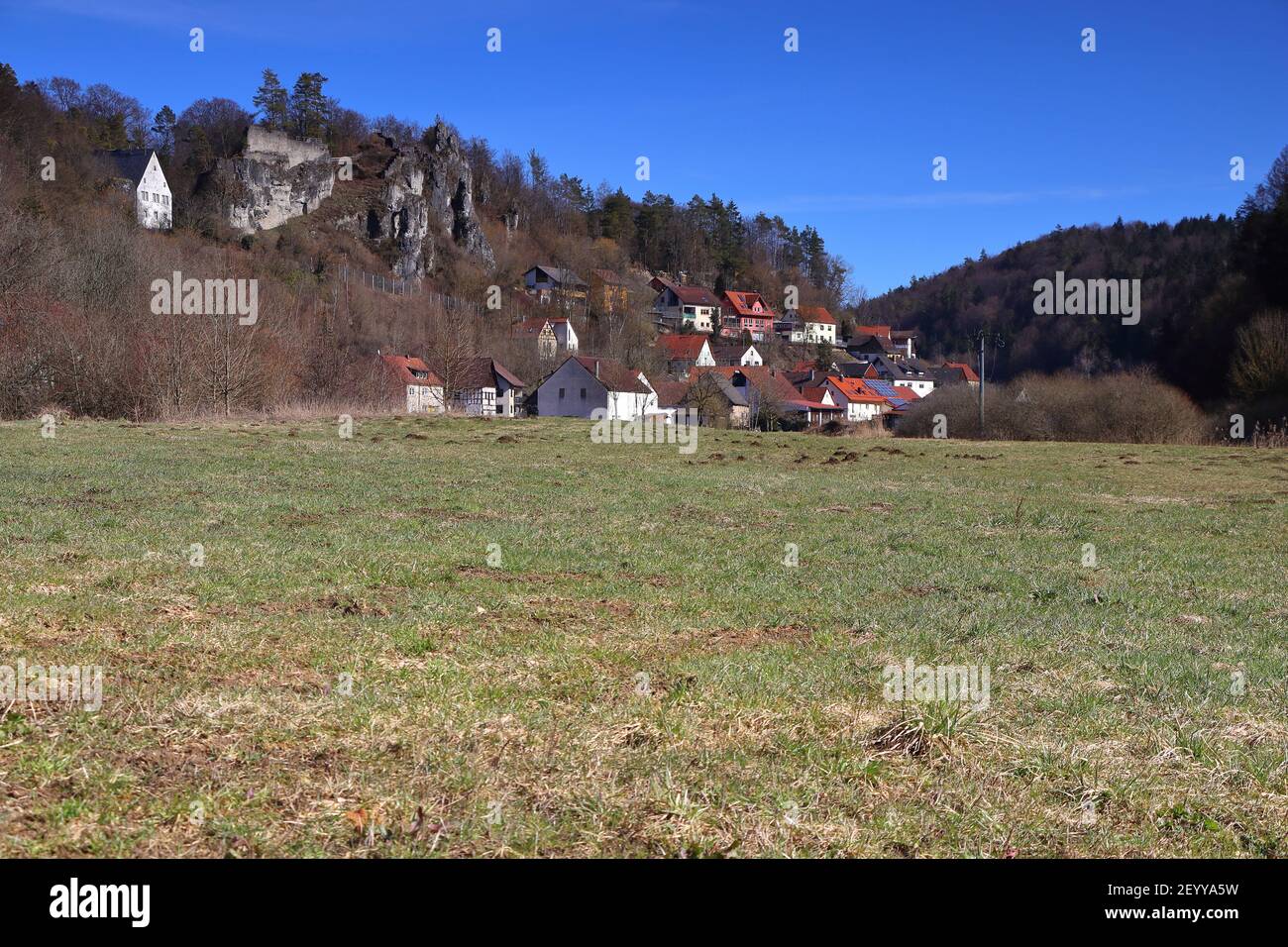 scenic village in a valley with rocks in the woodlands Stock Photo