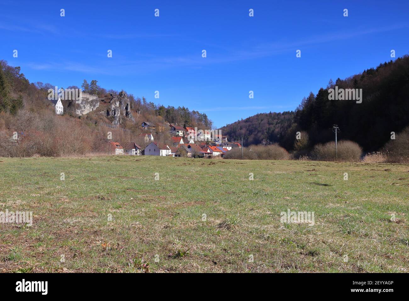 scenic village in a valley with rocks in the woodlands Stock Photo