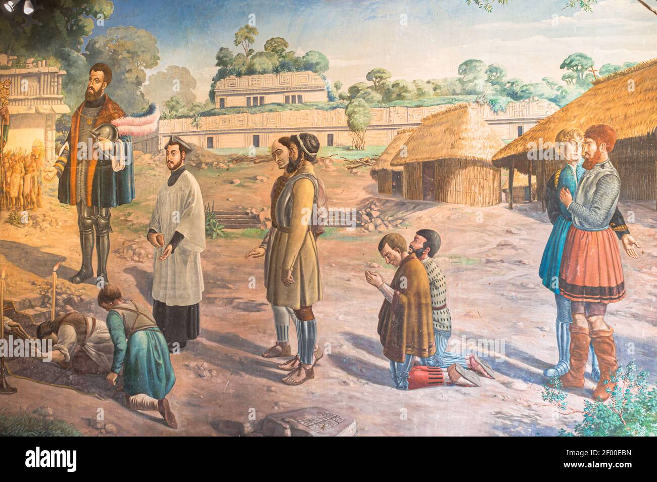 Painting at the Museo de Arte Sacro in Conkal, Yucatan, depicting the evangelisation of the Maya people on behalf of the Spanish conquistadores Stock Photo
