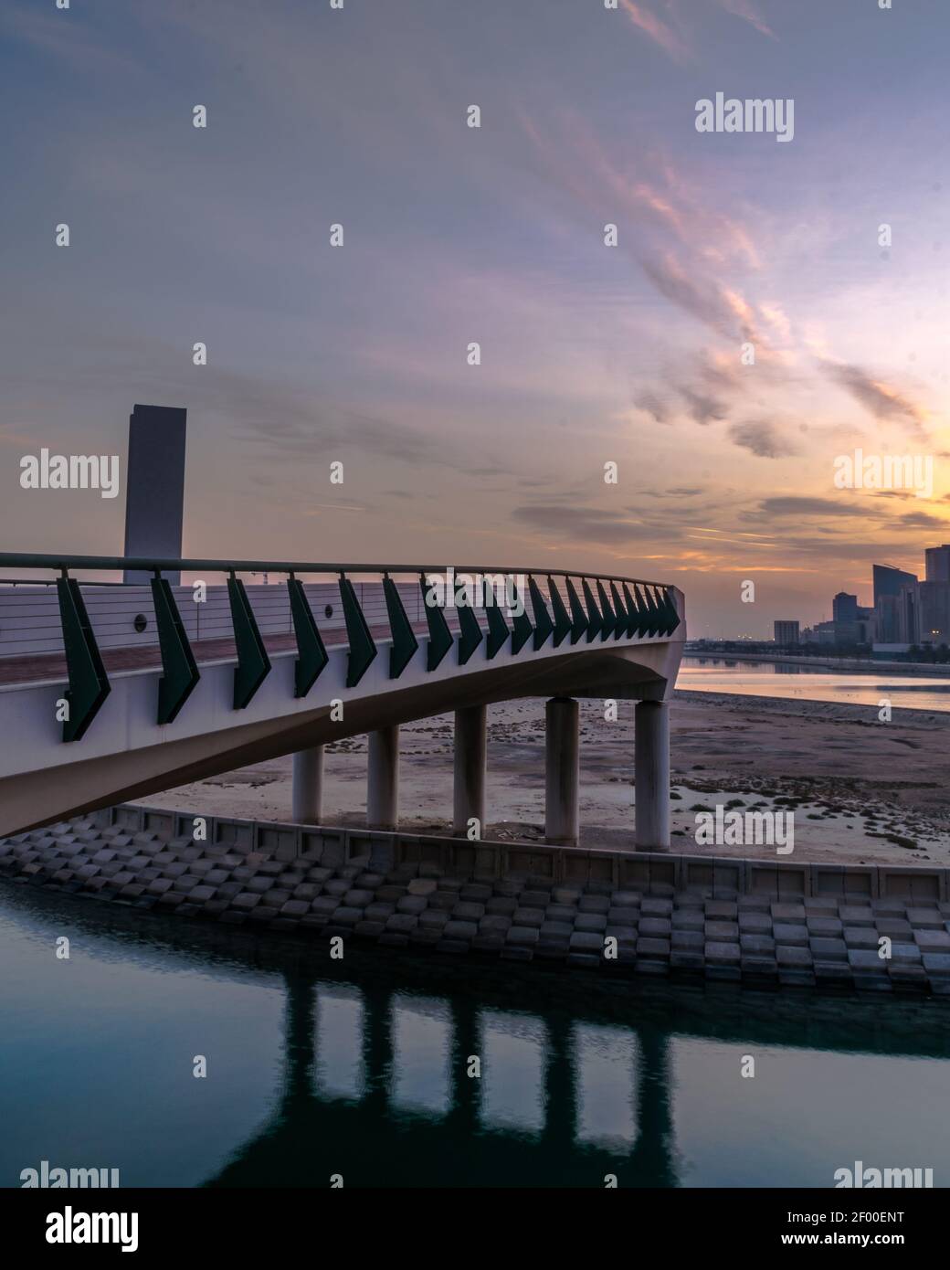 MANAMA, BAHRAIN - Dec 19, 2020: A view of the Dramatic morning sky and the bridge in Bahrain bay Stock Photo