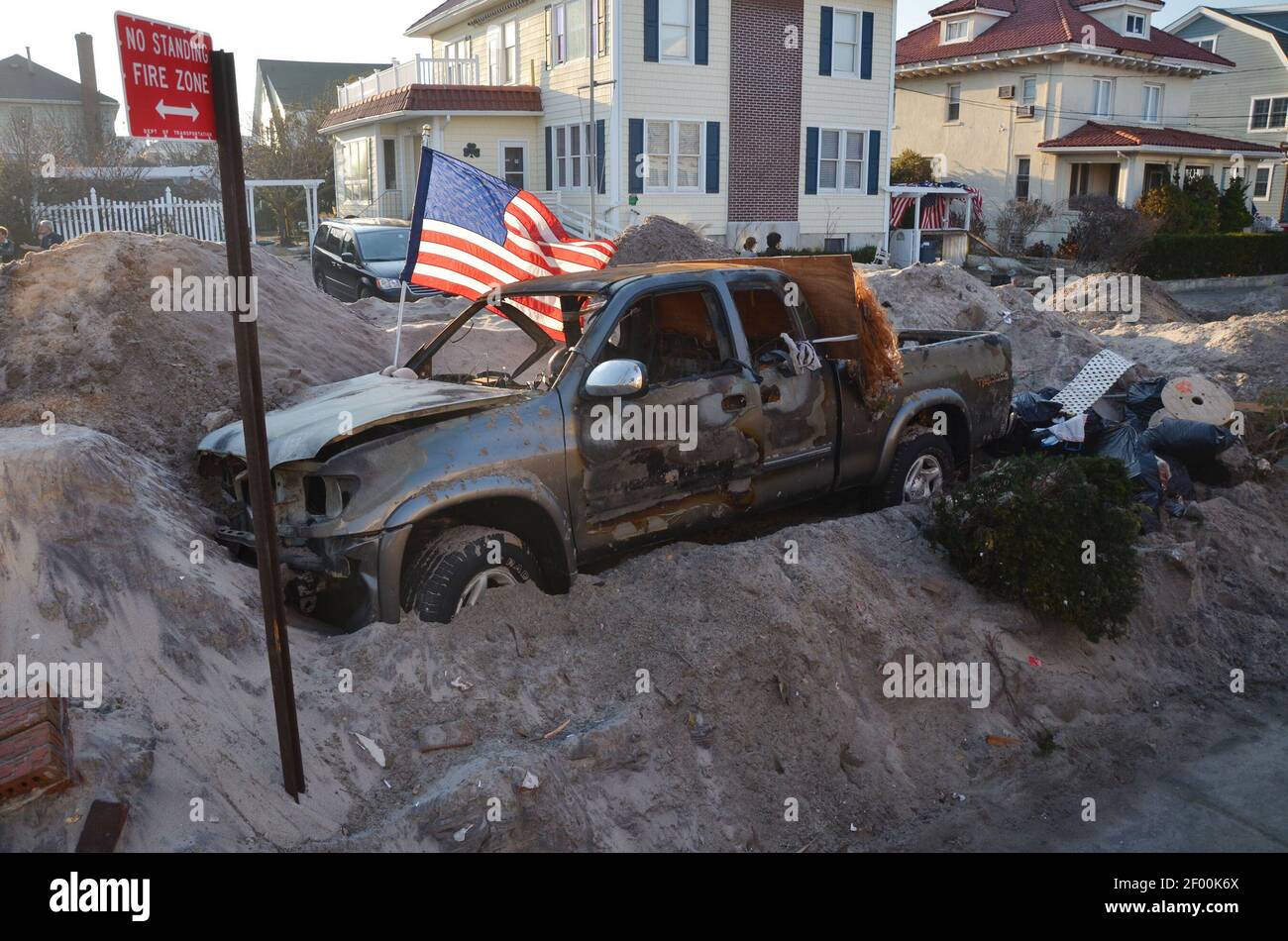 11 November 2012 New York, NY American flags are seen in the debris