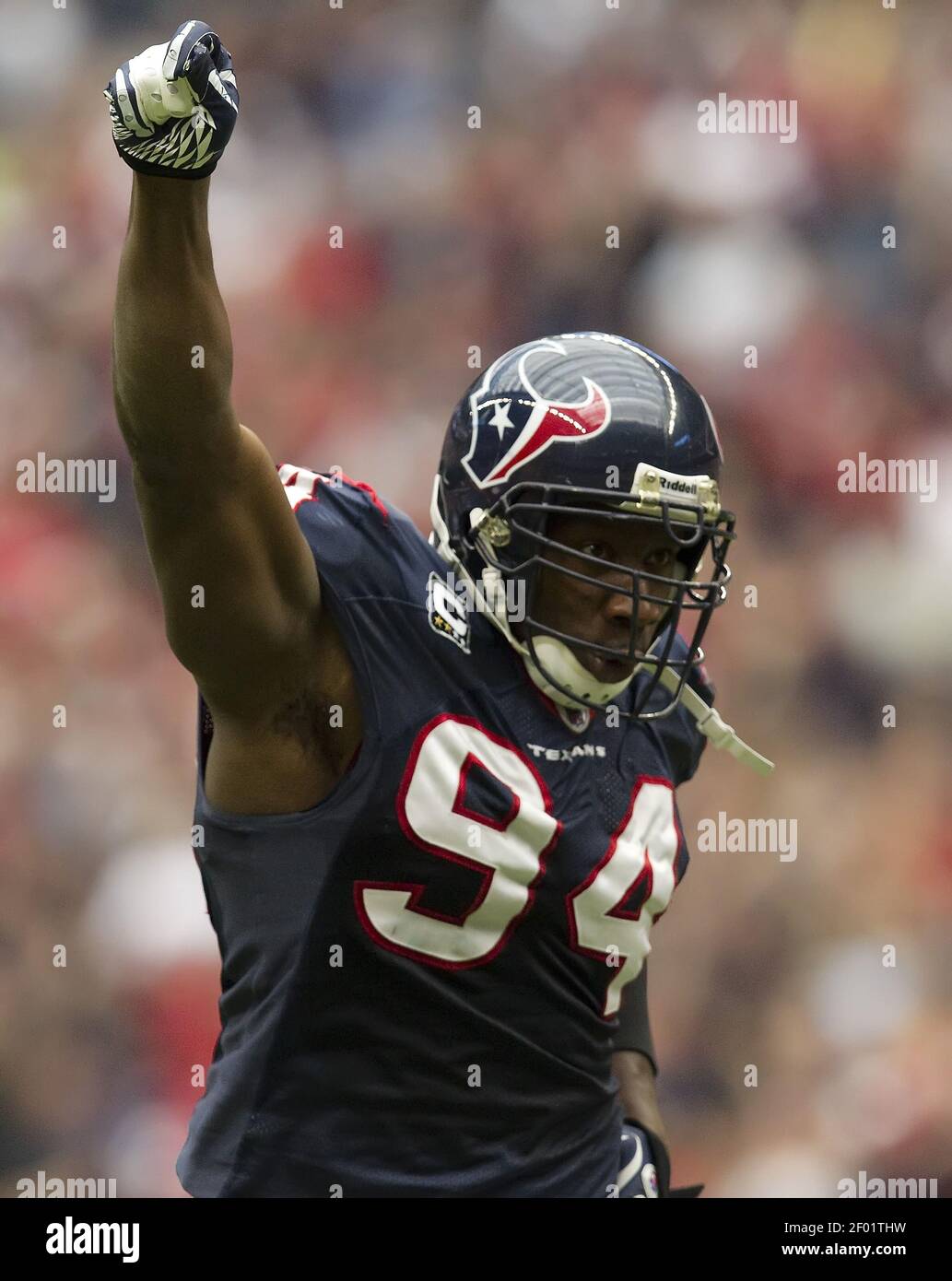 Antonio Smith (94) of the Houston Texans celebrates a sack against the  Tennessee Titans in the first half of their game on Sunday, January 1,  2012, in Houston, Texas. (Photo by George