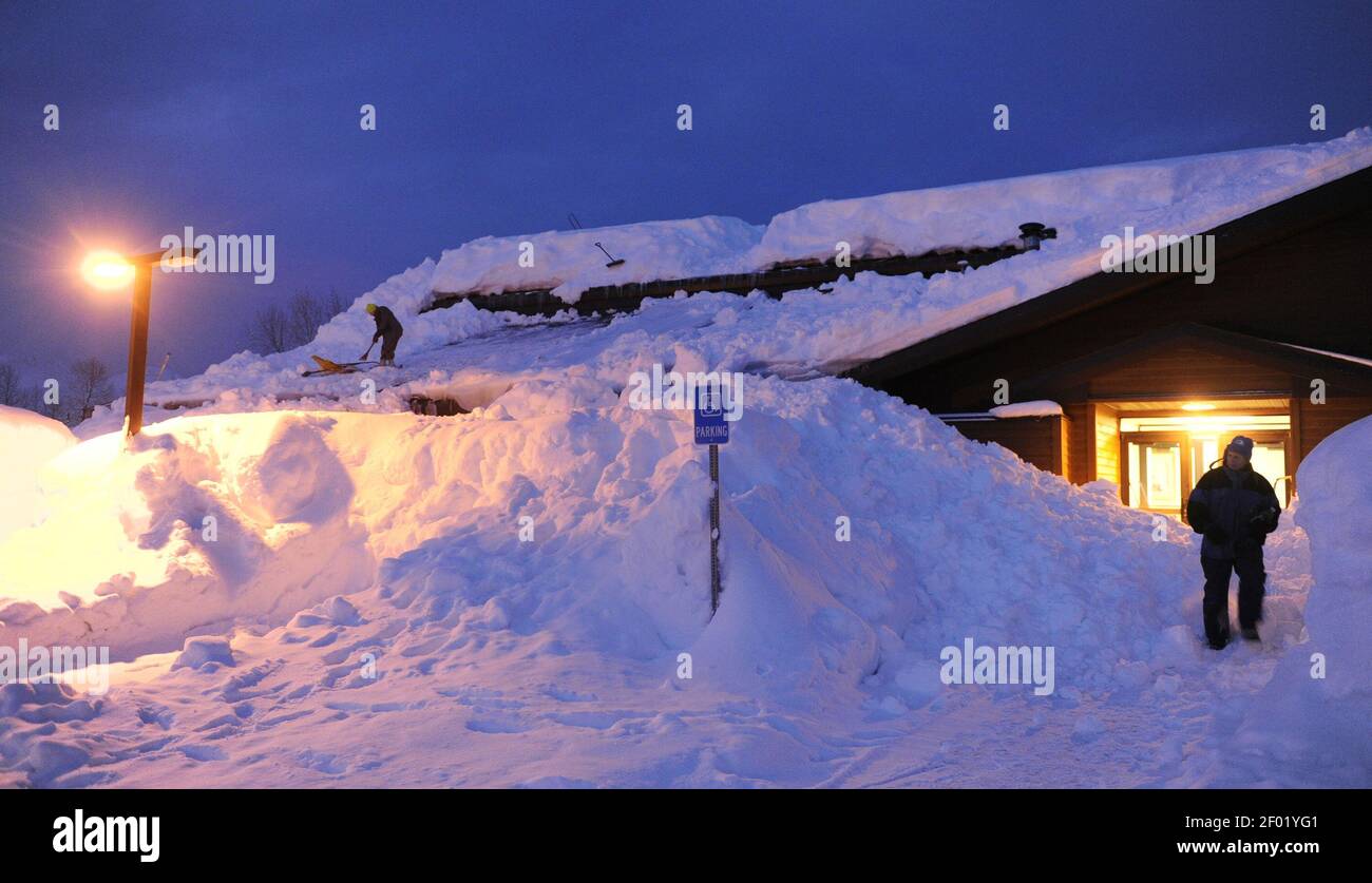 Valdez, Alaska, has received 322 inches of snow this winter, leaving residents challenged to clear streets and roofs. (Photo by Marc Lester/Anchorage Daily News/MCT/Sipa USA) Stock Photo