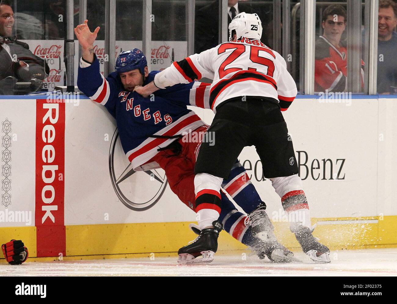 Mike Rupp roughing Marty Brodeur. NY Rangers vs New Jersey Devils