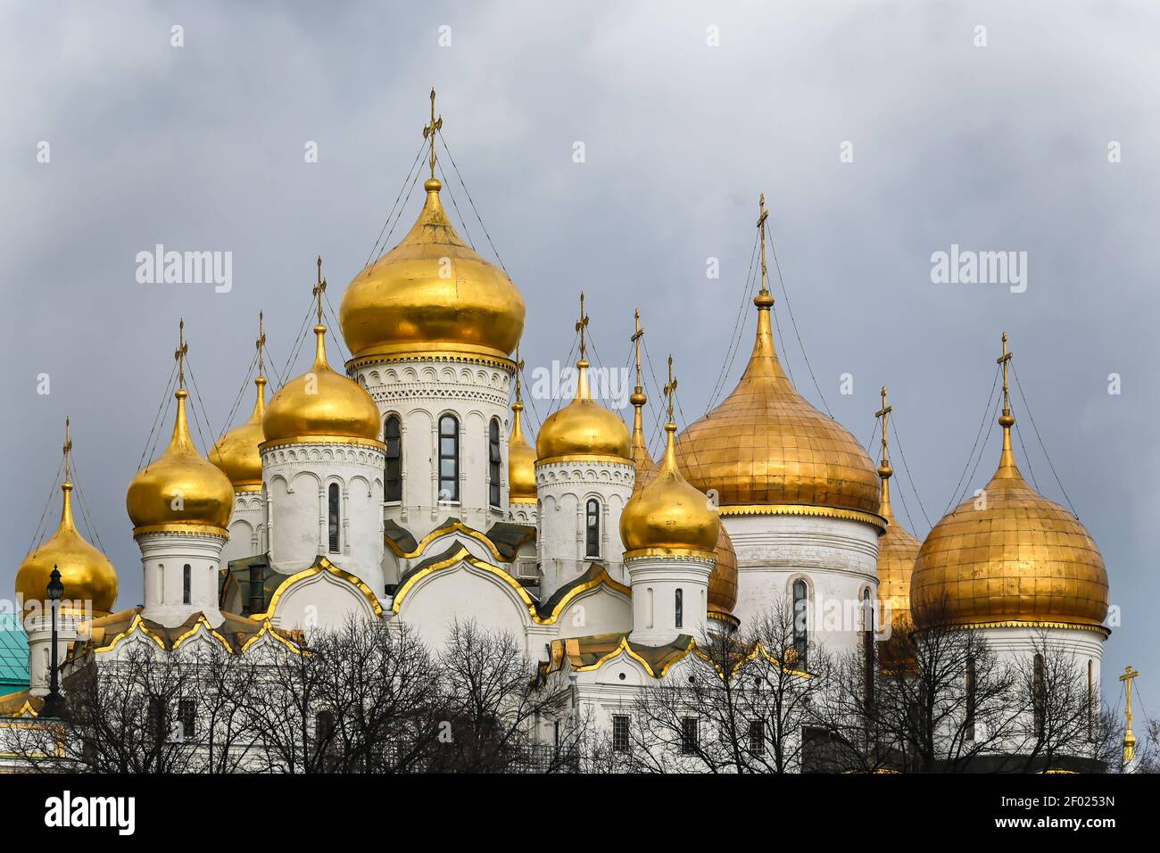 Cathedrals of the Kremlin. Golden domes of white-stone temples. Stock Photo