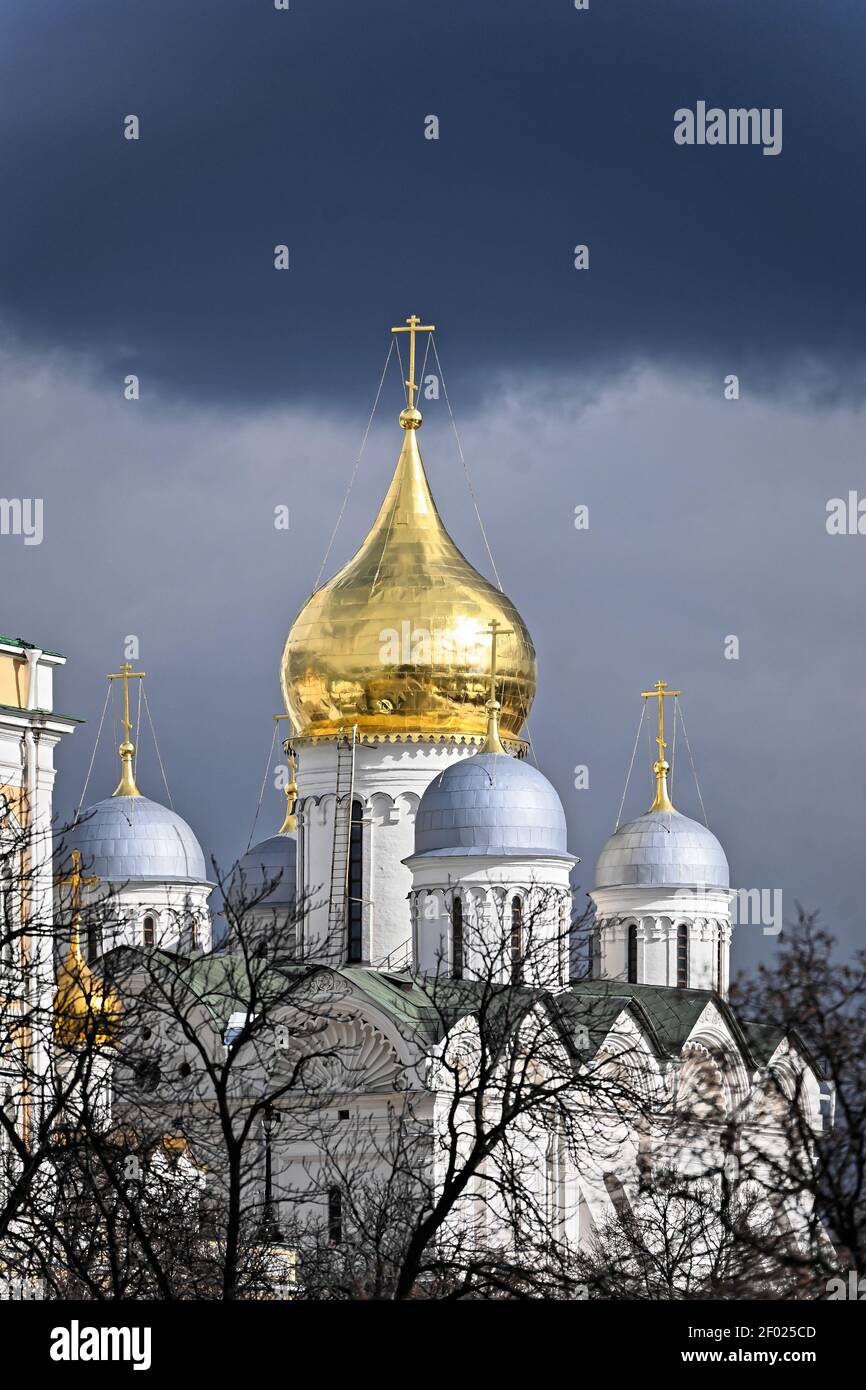 Cathedrals of the Kremlin. Golden domes of white-stone temples. Stock Photo