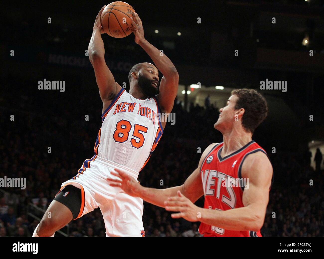 The New York Knicks' Baron Davis (85) looks to pass against the New Jersey  Nets' Kris Humphries (43) at Madison Square Garden in New York City,  Monday, February 20 2012. (Photo by