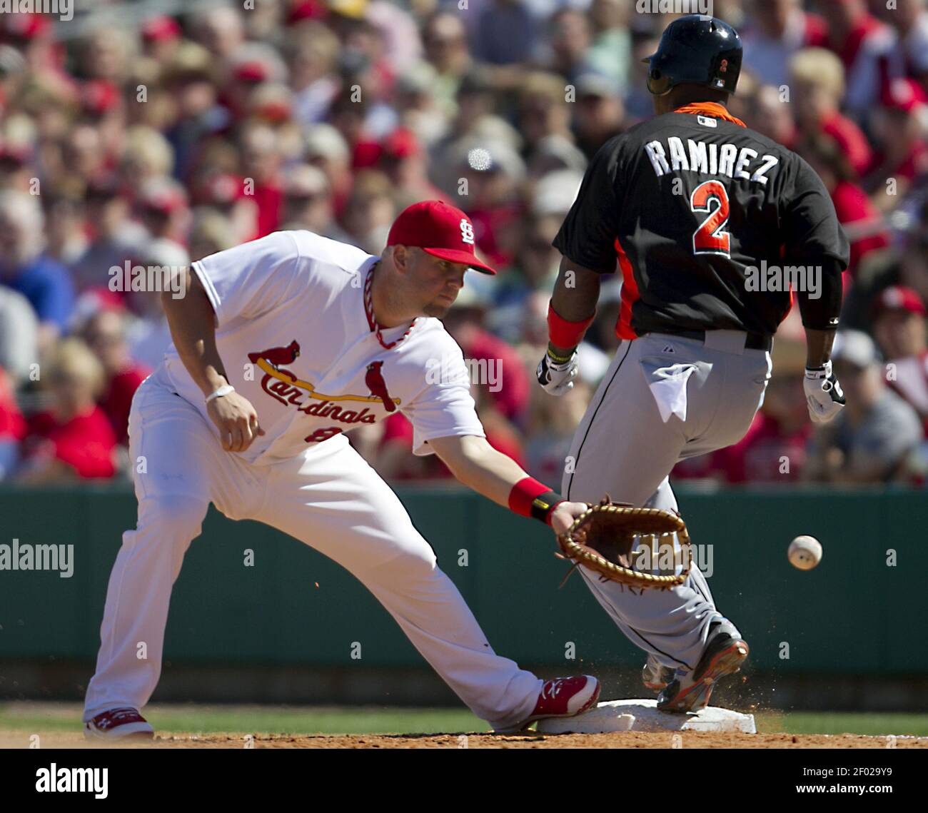 Miami Marlins Hanley Ramirez beats the throw to St. Louis Cardinals