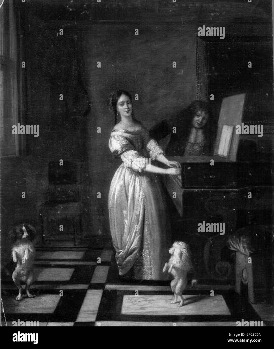 Pieter de Hooch - Woman playing the virginal with a man and two dancing dogs. Stock Photo