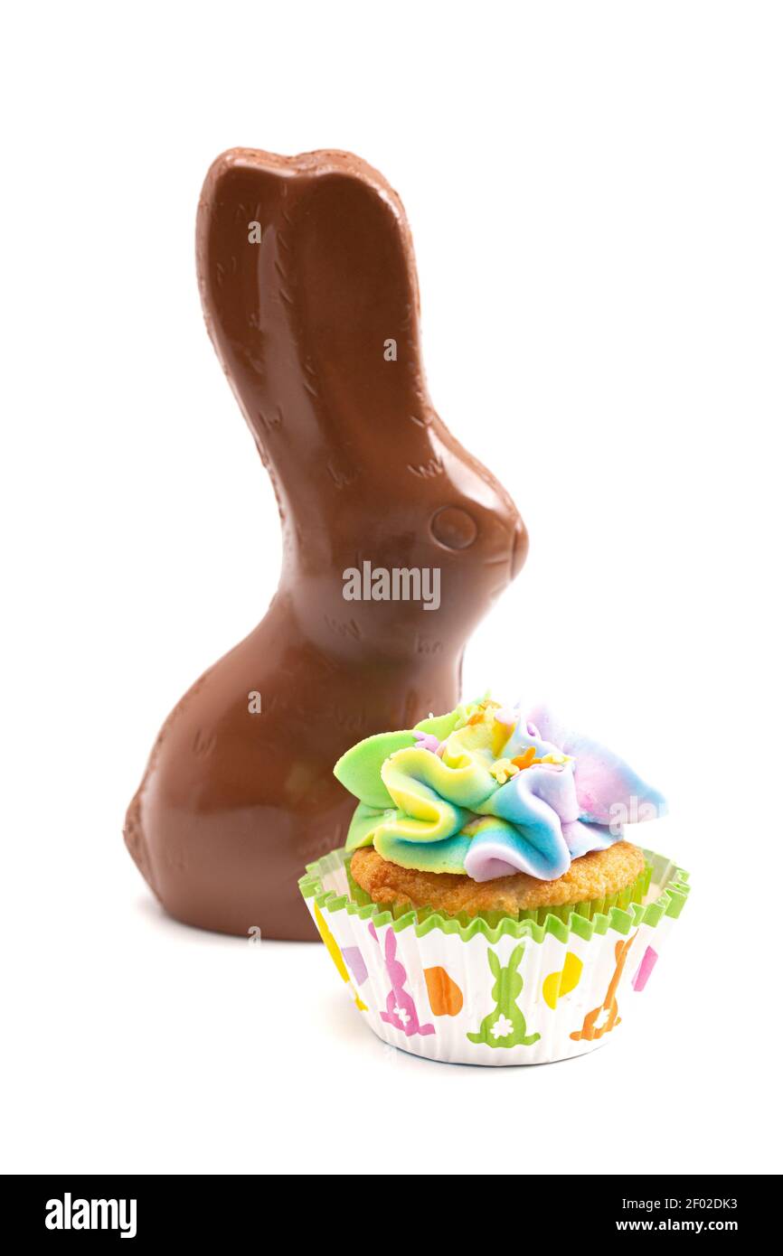 Chocolate Easter Bunny and Cupcakes Isolated on a White Background Stock Photo