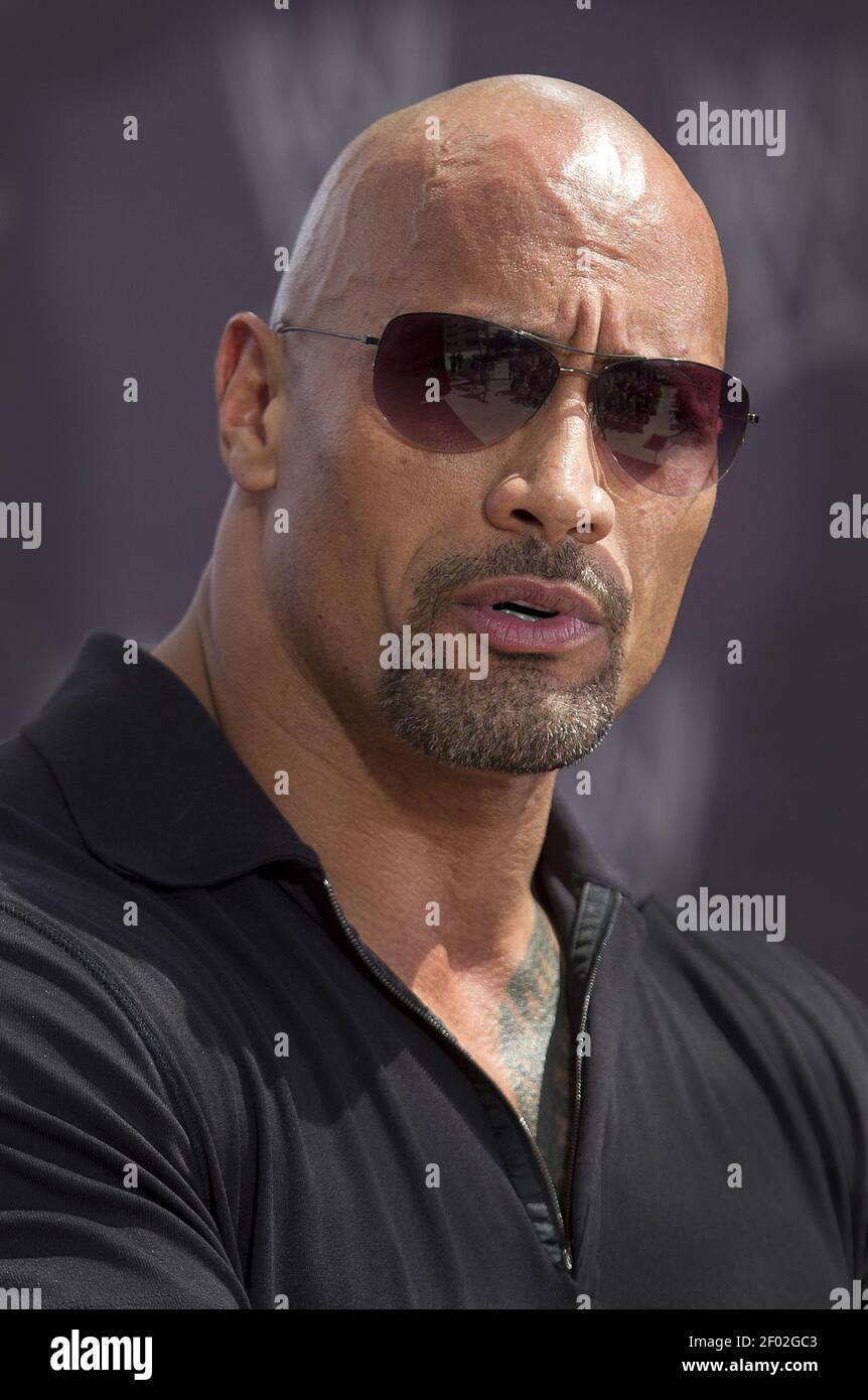 Dwayne The Rock Johnson, John Cena in attendance for WRESTLEMANIA XXVII  Press Conference, Hard Rock Cafe, New York, NY March 30, 2011. Photo By:  Rob Rich/Everett Collection Stock Photo - Alamy