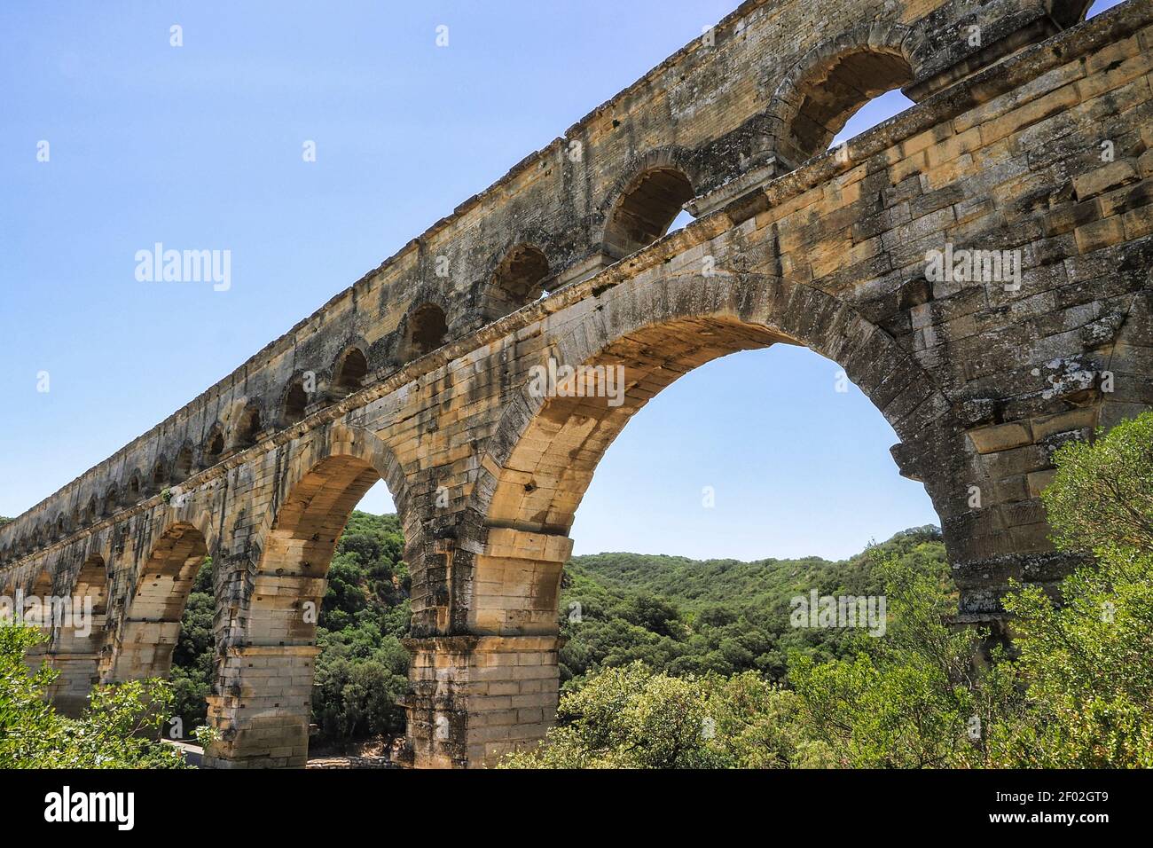 The Pont du Gard is an ancient Roman aqueduct bridge built in the first century AD , an intresting photo Stock Photo