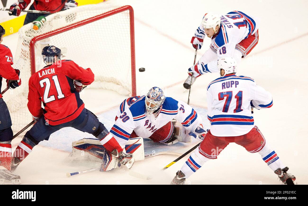 New York Rangers Goalie Henrik Lundqvist 30 Makes A Save On A Shot By Washington Capitals Center Brooks Laich 21 During The Second Period Of Game 3 Of The Nhl Eastern Conference