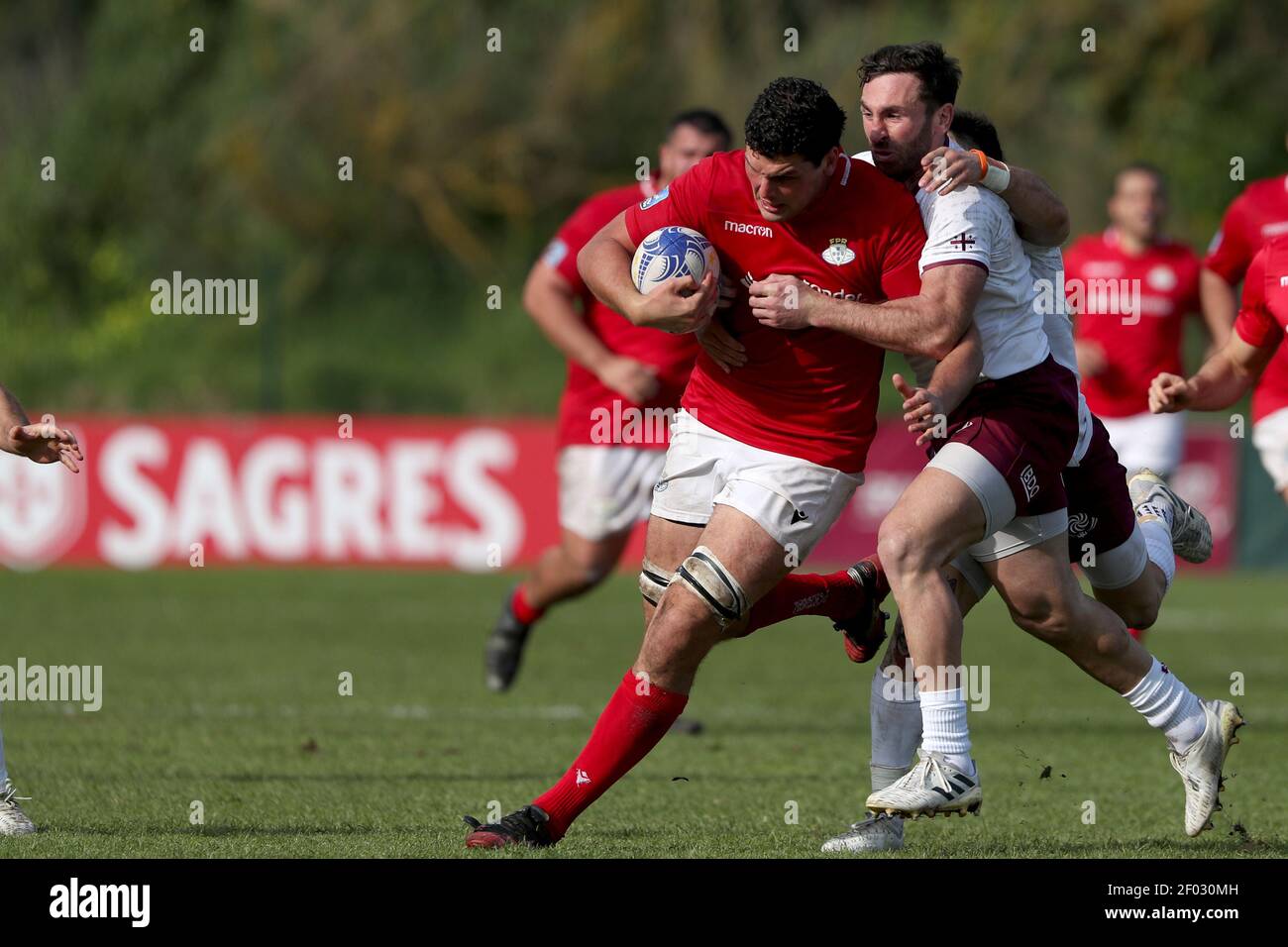 Lisbon, Portugal. 6th Mar, 2021. Jose Rebelo de Andrade of Portugal (C ) vies with Aleksandre Todua of Georgia (R ) during the Rugby Europe Championship match between Portugal and Georgia at the Jamor field in Lisbon, Portugal on March 6, 2021. Credit: Pedro Fiuza/ZUMA Wire/Alamy Live News Stock Photo
