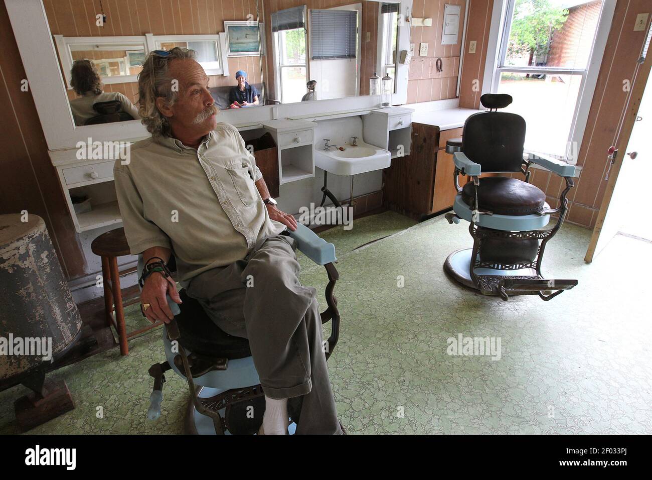 Bill Lucado Jr. sits inside the town in Toomsboro,