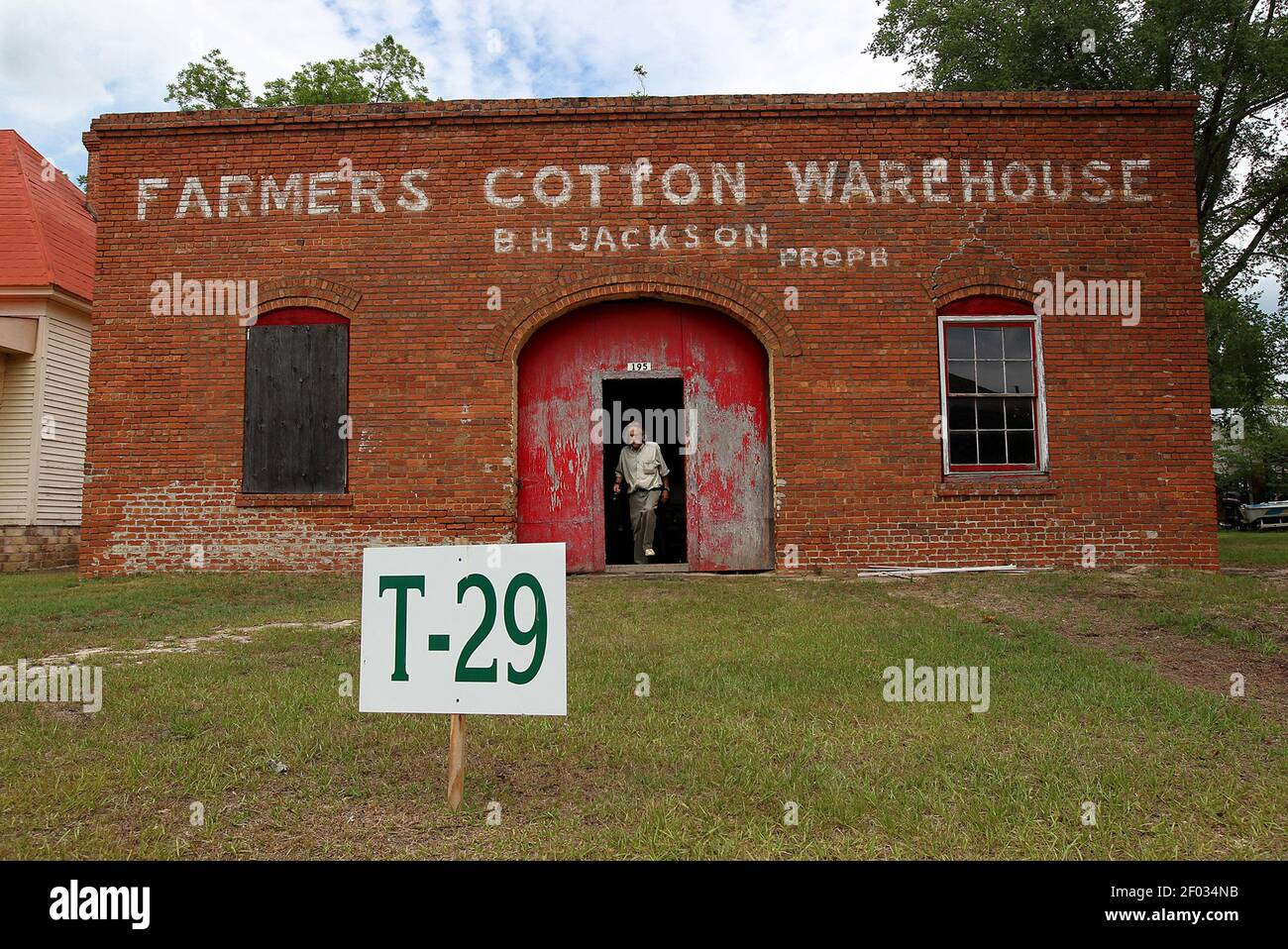 The Farmers Cotton Warehouse is one of the buildings up for sale in
