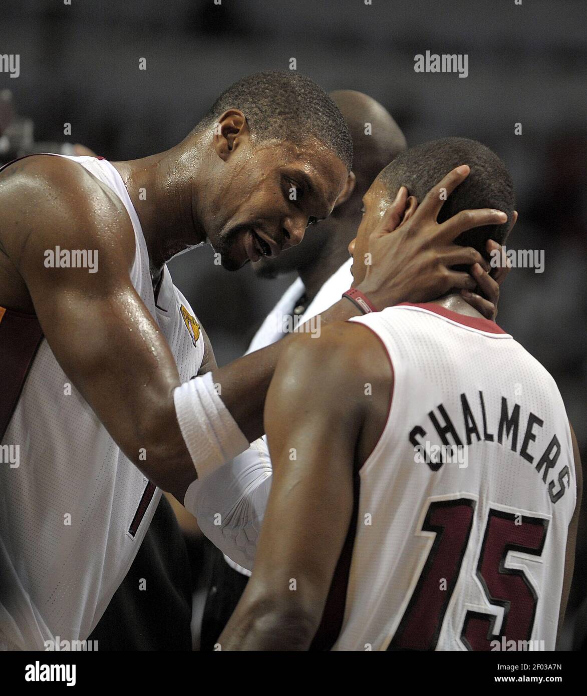 Miami Heat forward Chris Bosh has a word for teammate Mario Chalmers after  he missed a defensive assignment during the fourth quarter in Game 3 of the  NBA Finals at the AmericanAirlines