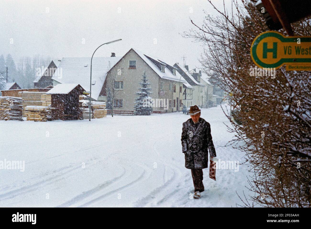snow-covered street, February 1983, Wenholthausen, Eslohe, Sauerland, North Rhine-Westphalia, Germany Stock Photo