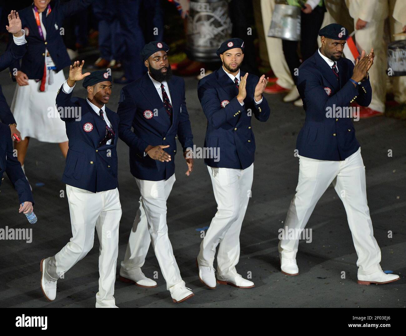 Members Of The Usa Men S Basketball Team And Nba Players Left To Right Chris Paul James Harden Deron Williams And Lebron James March Into The Olympic Stadium During The Opening Ceremony For