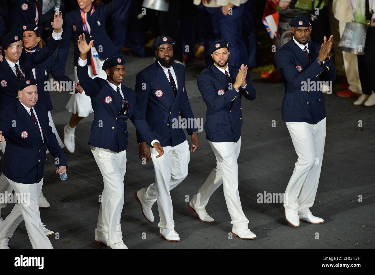 Members Of The Usa Men S Basketball Team And Nba Players Left To Right Chris Paul James Harden Deron Williams And Lebron James March Into The Olympic Stadium During The Opening Ceremony For