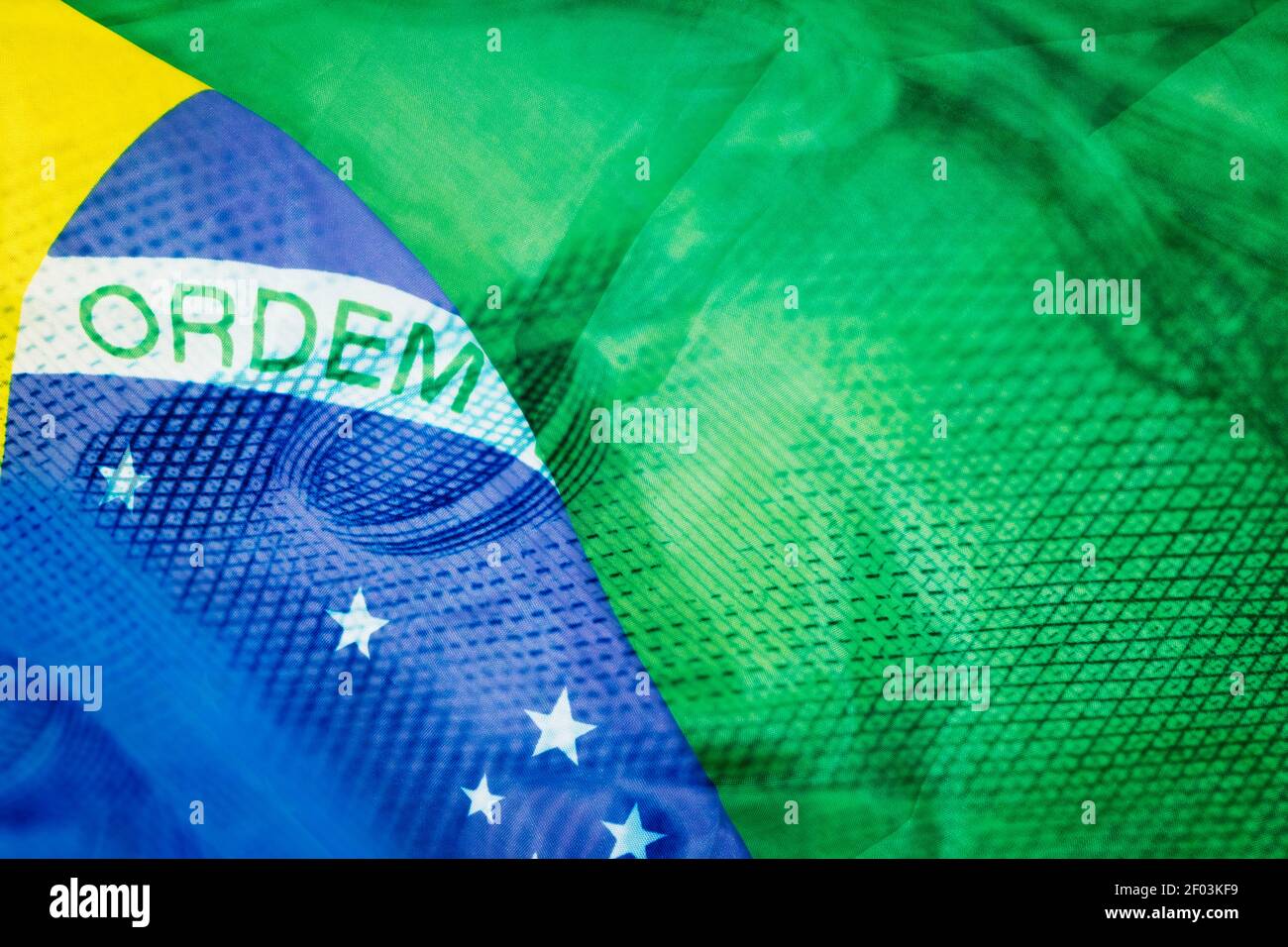 Brazilian money called Real and flag of Brazil image concept Stock Photo